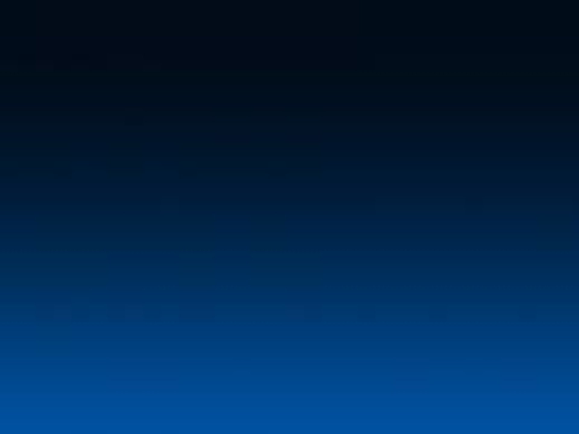 a close up of a yellow object with a black background