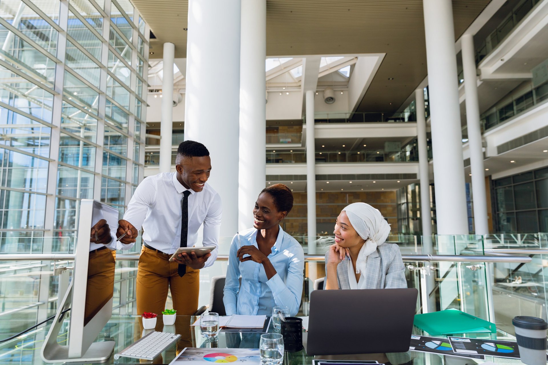 an abstract photo of a curved building with a blue sky in the background