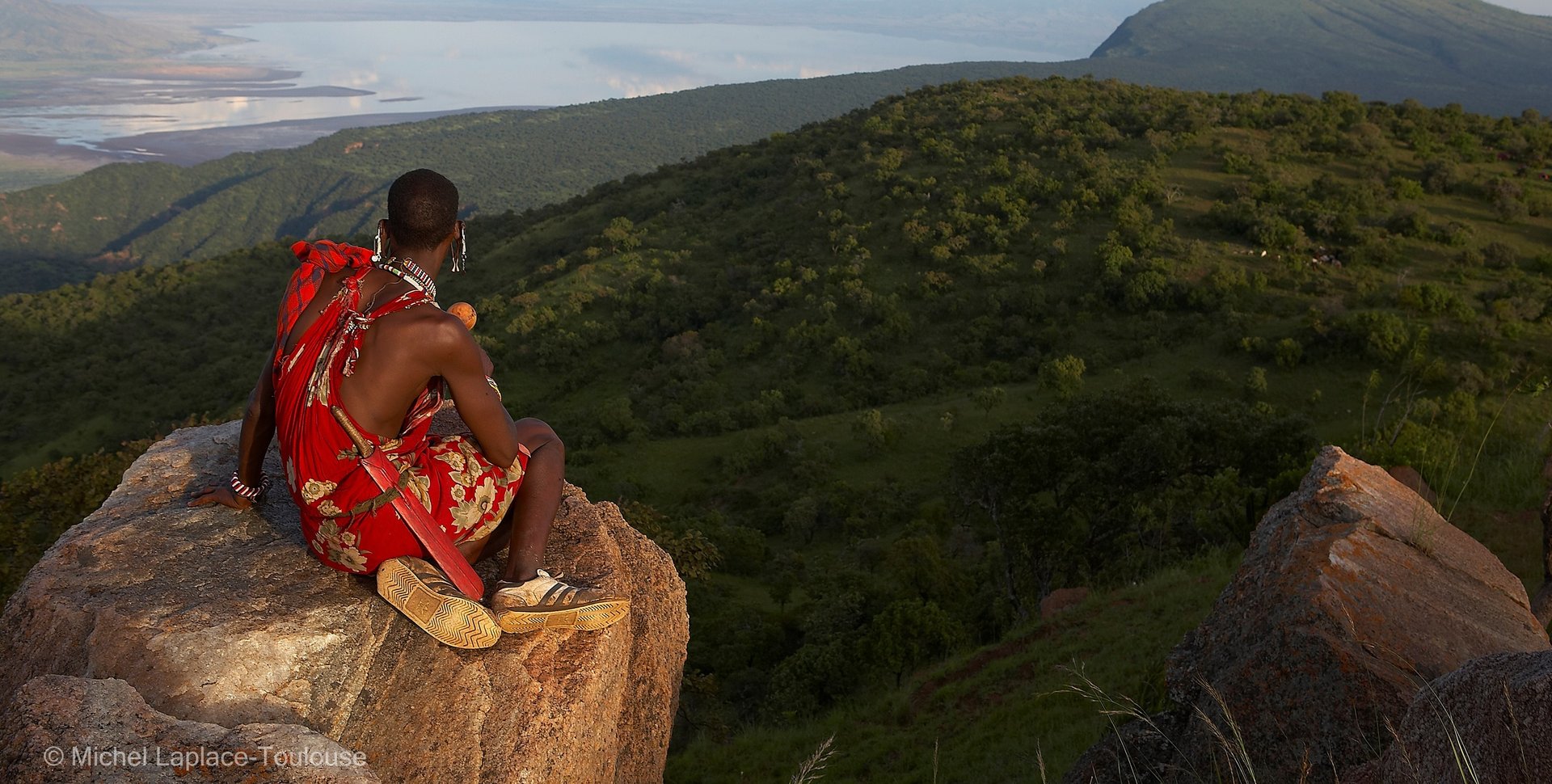 an abstract photo of a curved building with a blue sky in the background