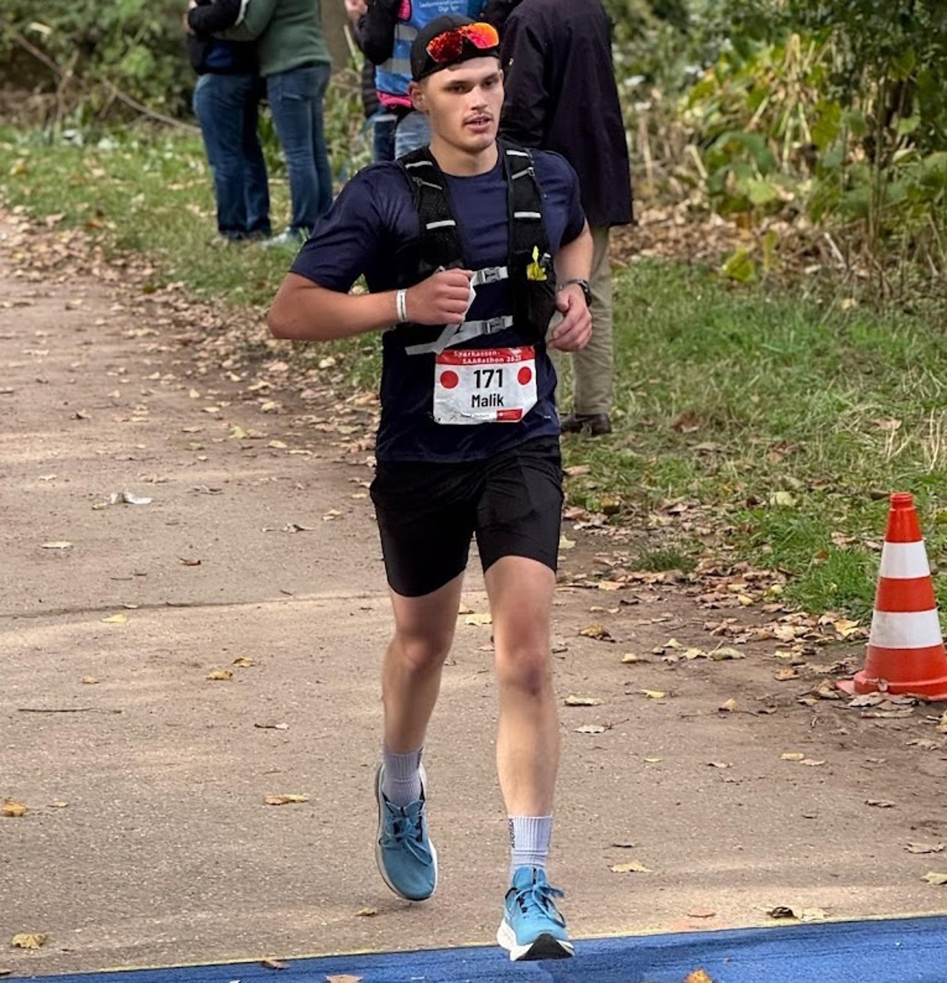 black and brown leather padded tub sofa