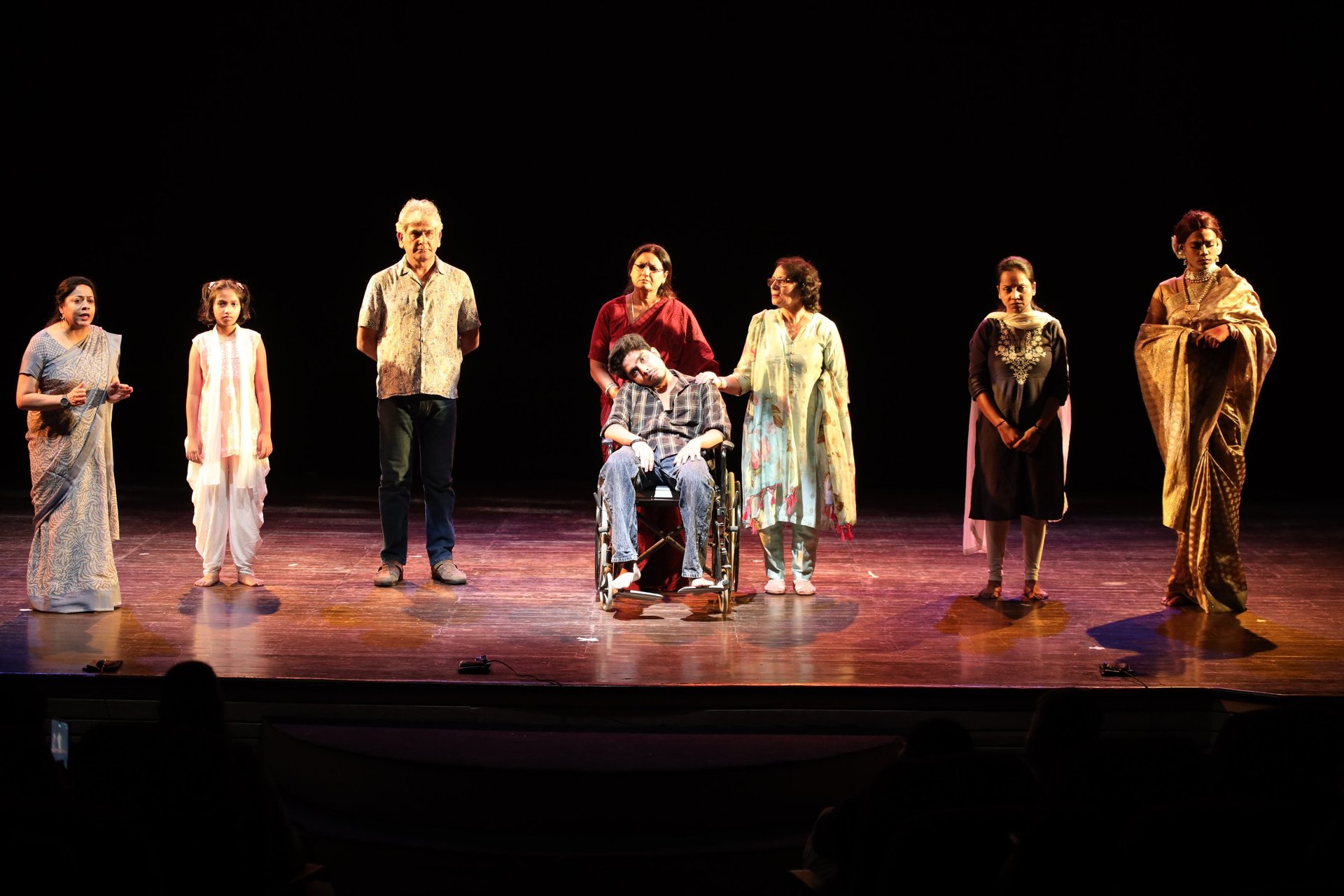 woman wearing yellow long-sleeved dress under white clouds and blue sky during daytime