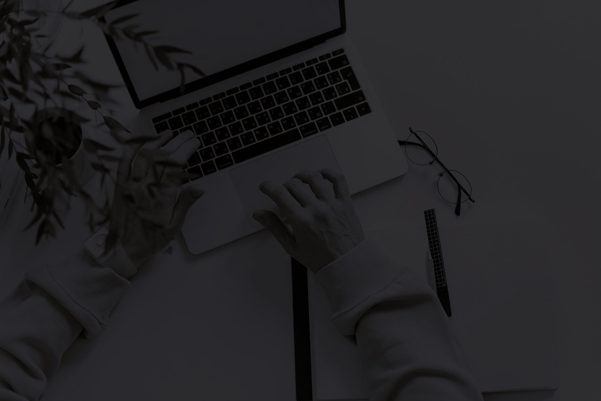 an abstract photo of a curved building with a blue sky in the background