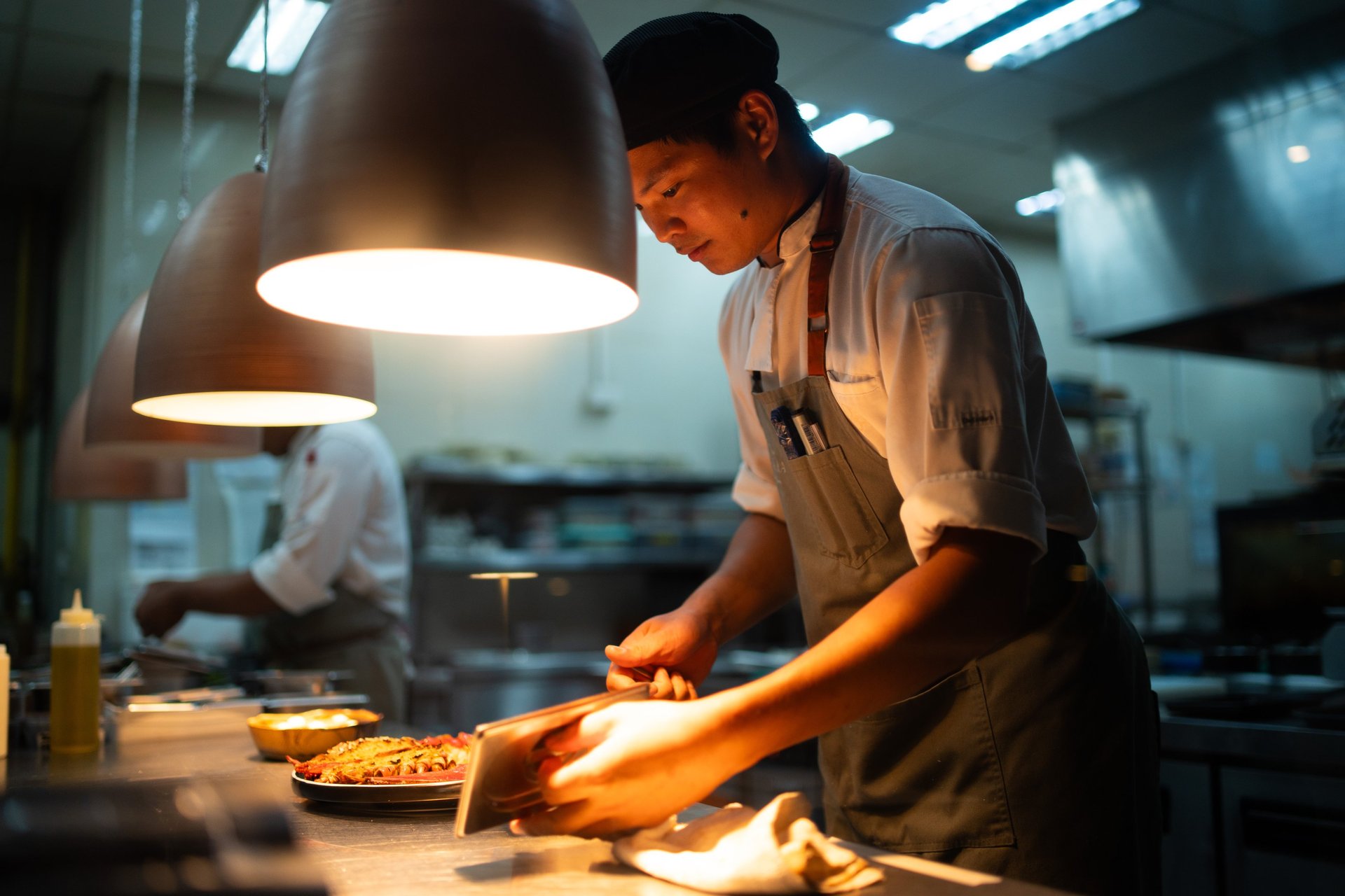 woman wearing yellow long-sleeved dress under white clouds and blue sky during daytime