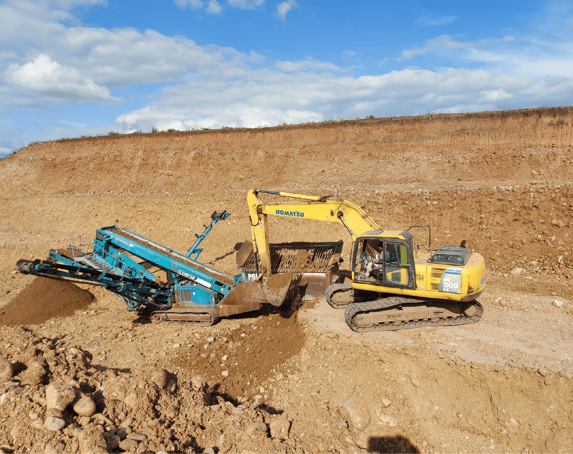 an abstract photo of a curved building with a blue sky in the background