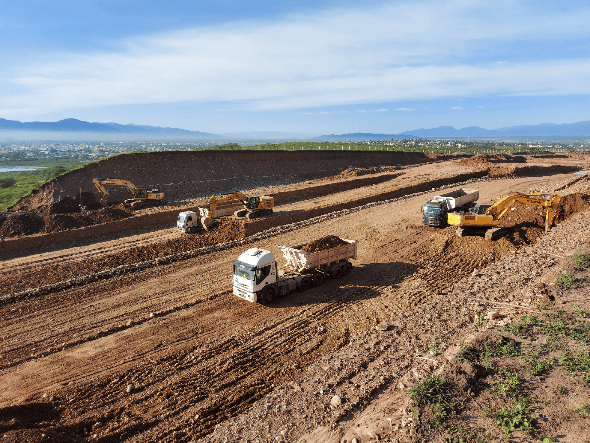 an abstract photo of a curved building with a blue sky in the background