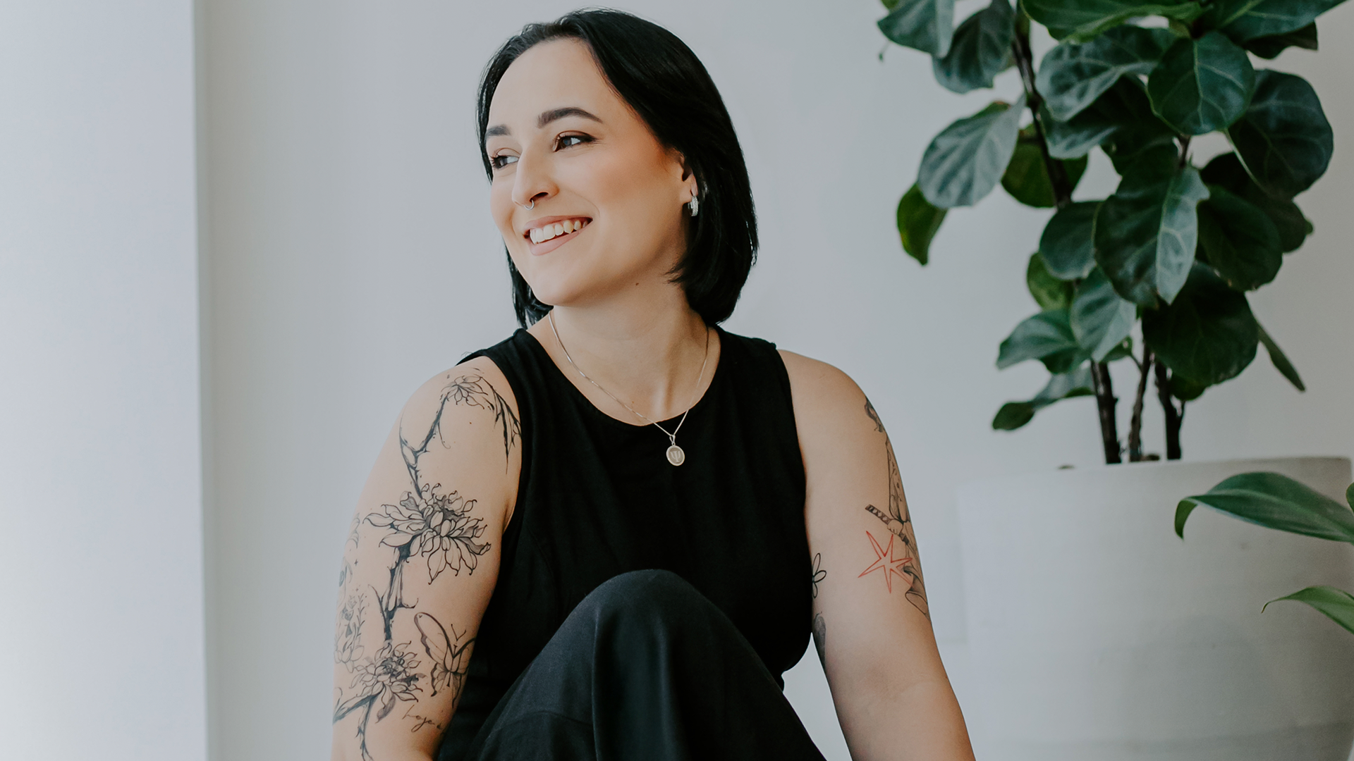 black and brown leather padded tub sofa