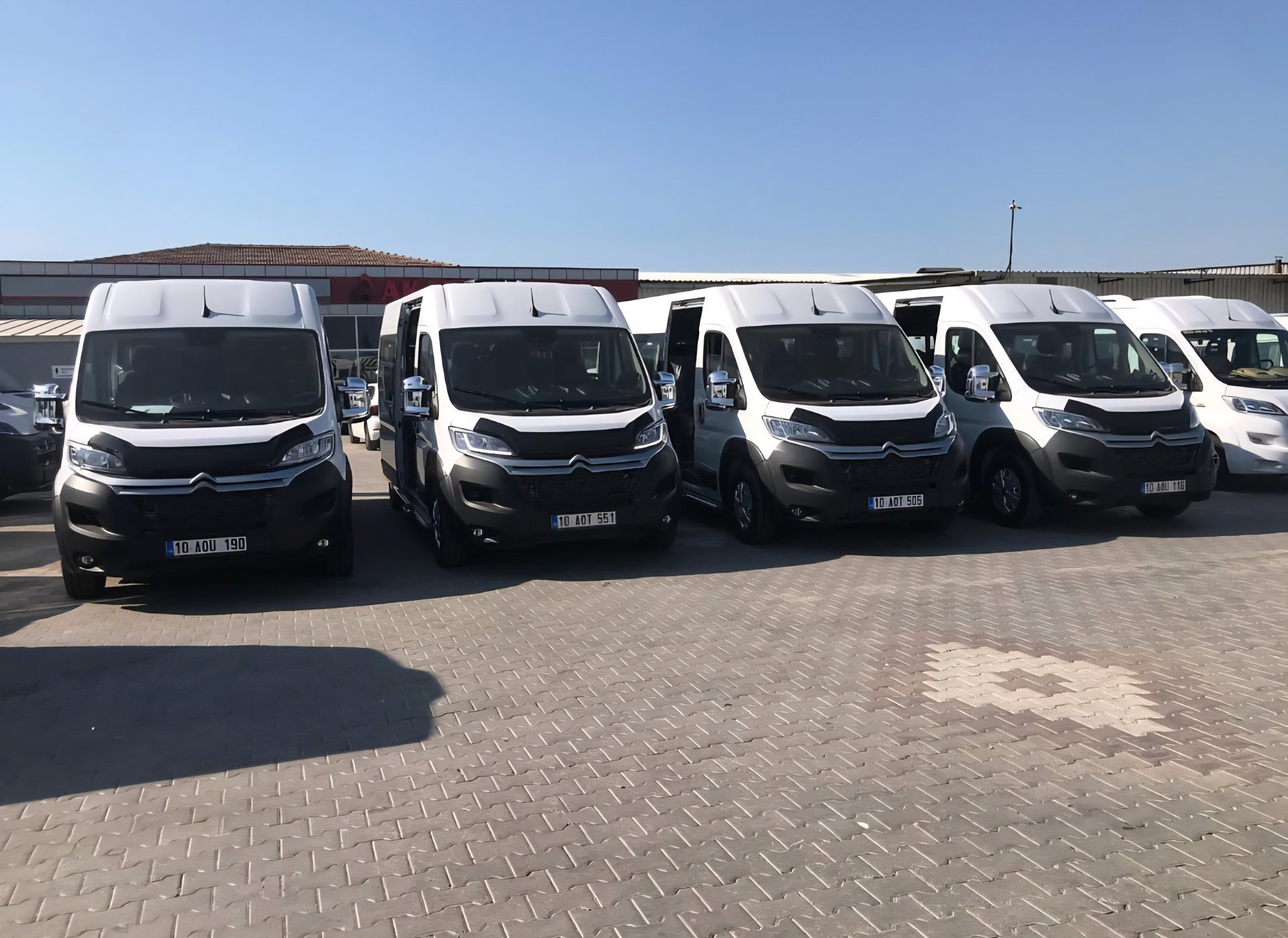 black and brown leather padded tub sofa