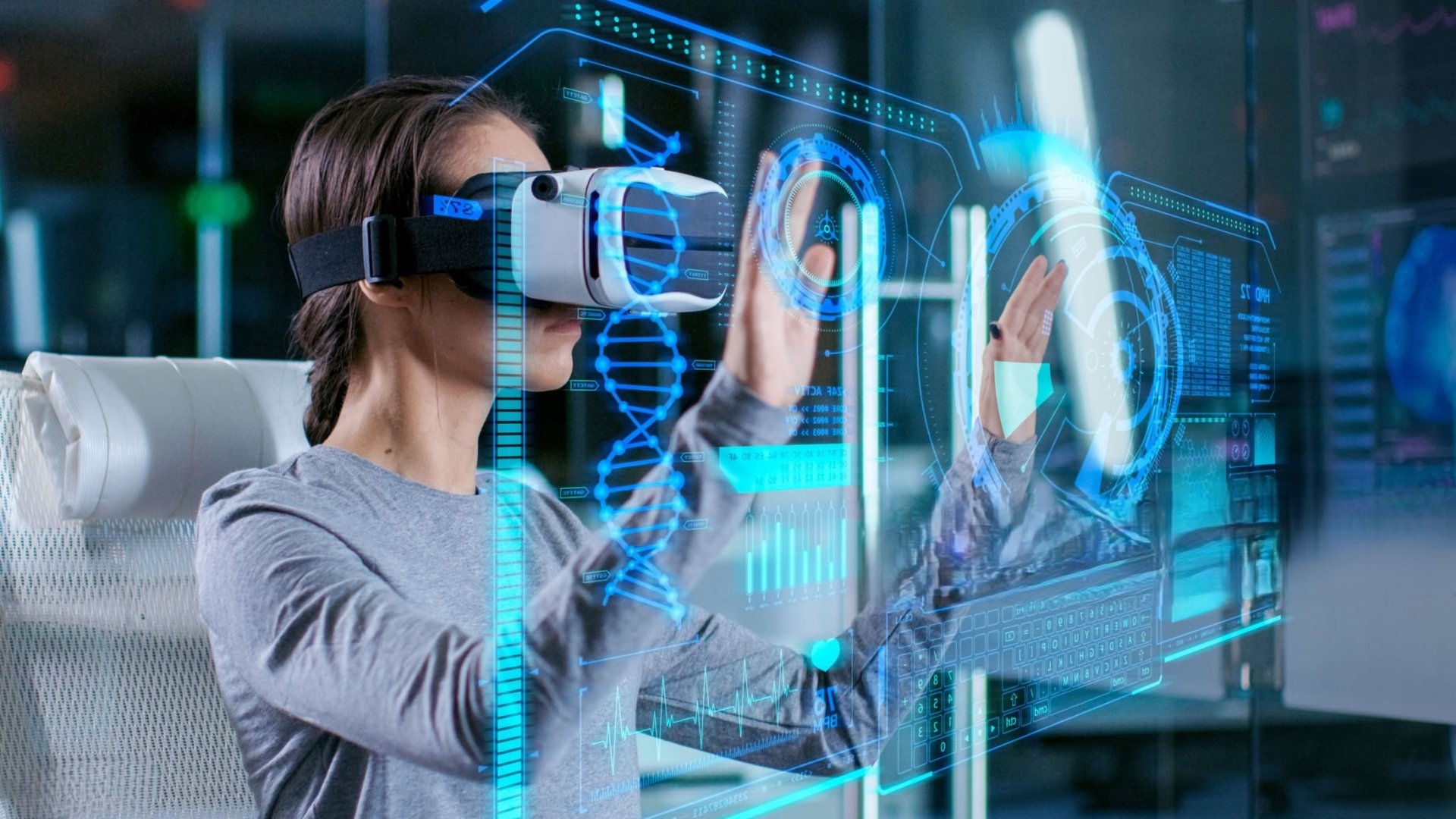 woman in black coat using MacBook