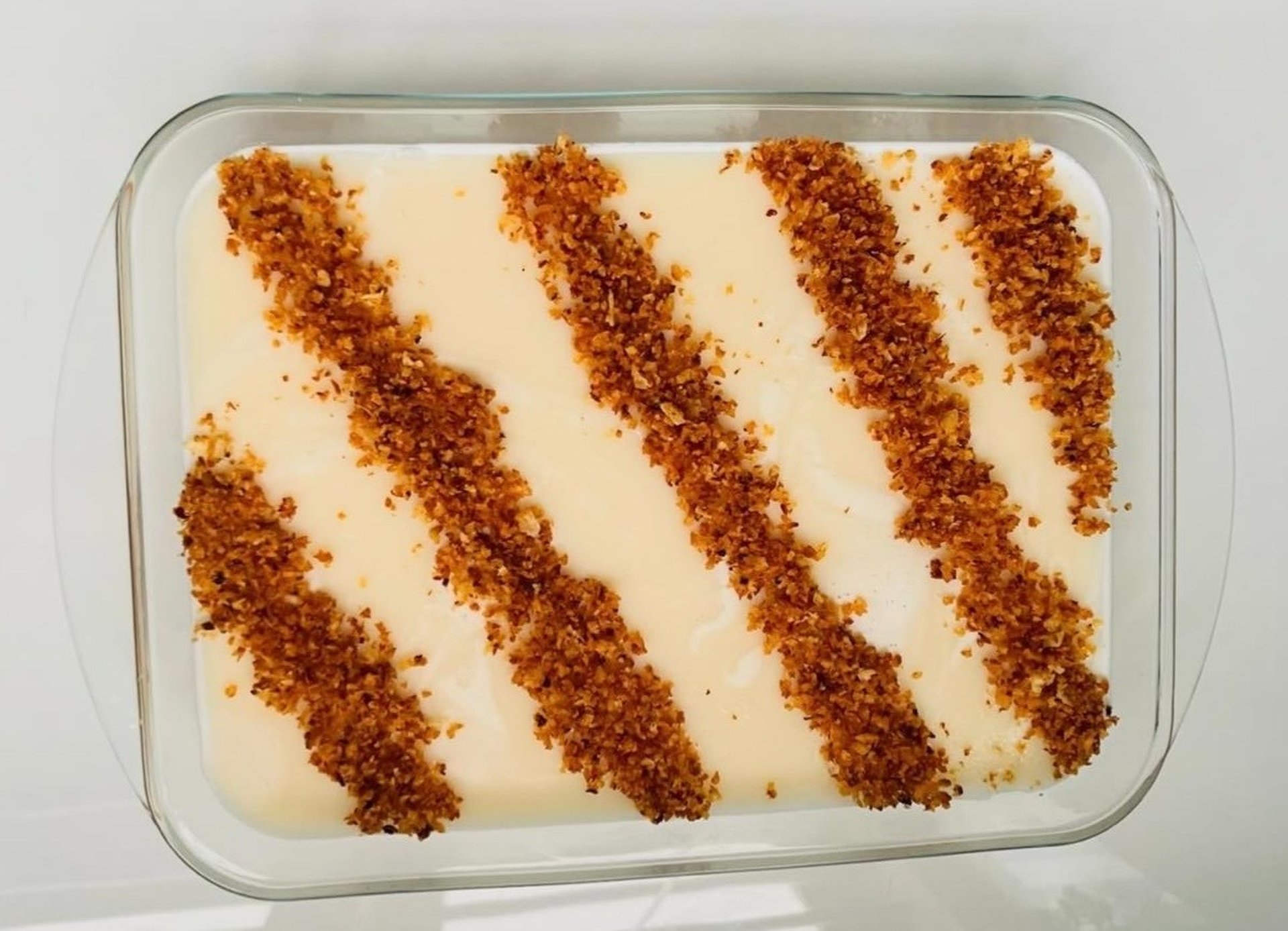 Coconut milk with caramelised pudding