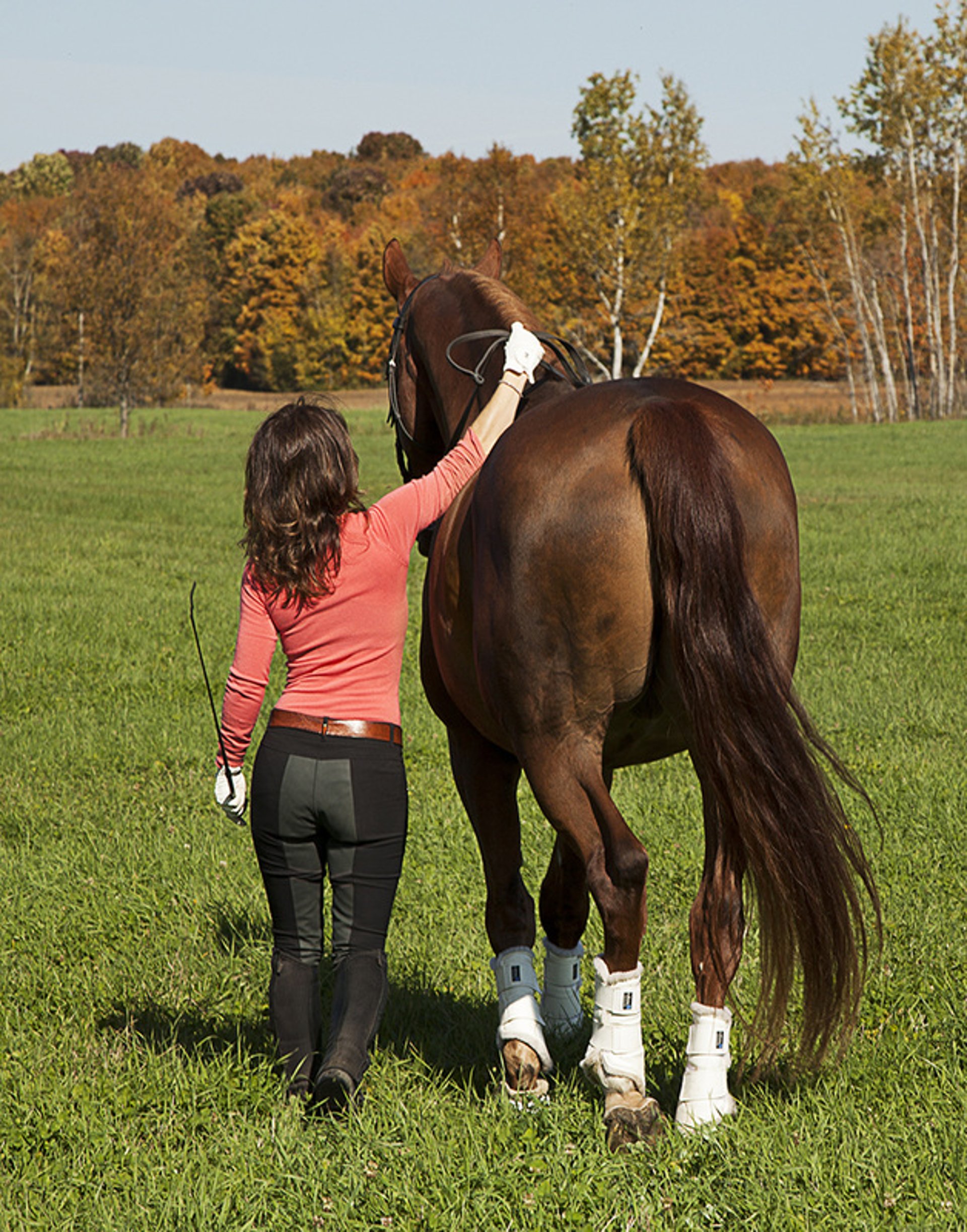 woman wearing yellow long-sleeved dress under white clouds and blue sky during daytime