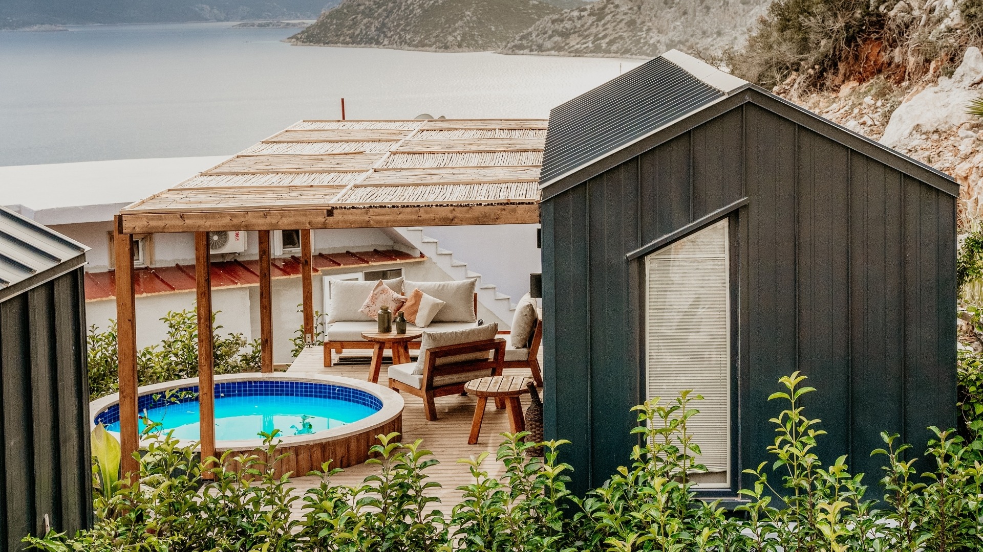 black and brown leather padded tub sofa