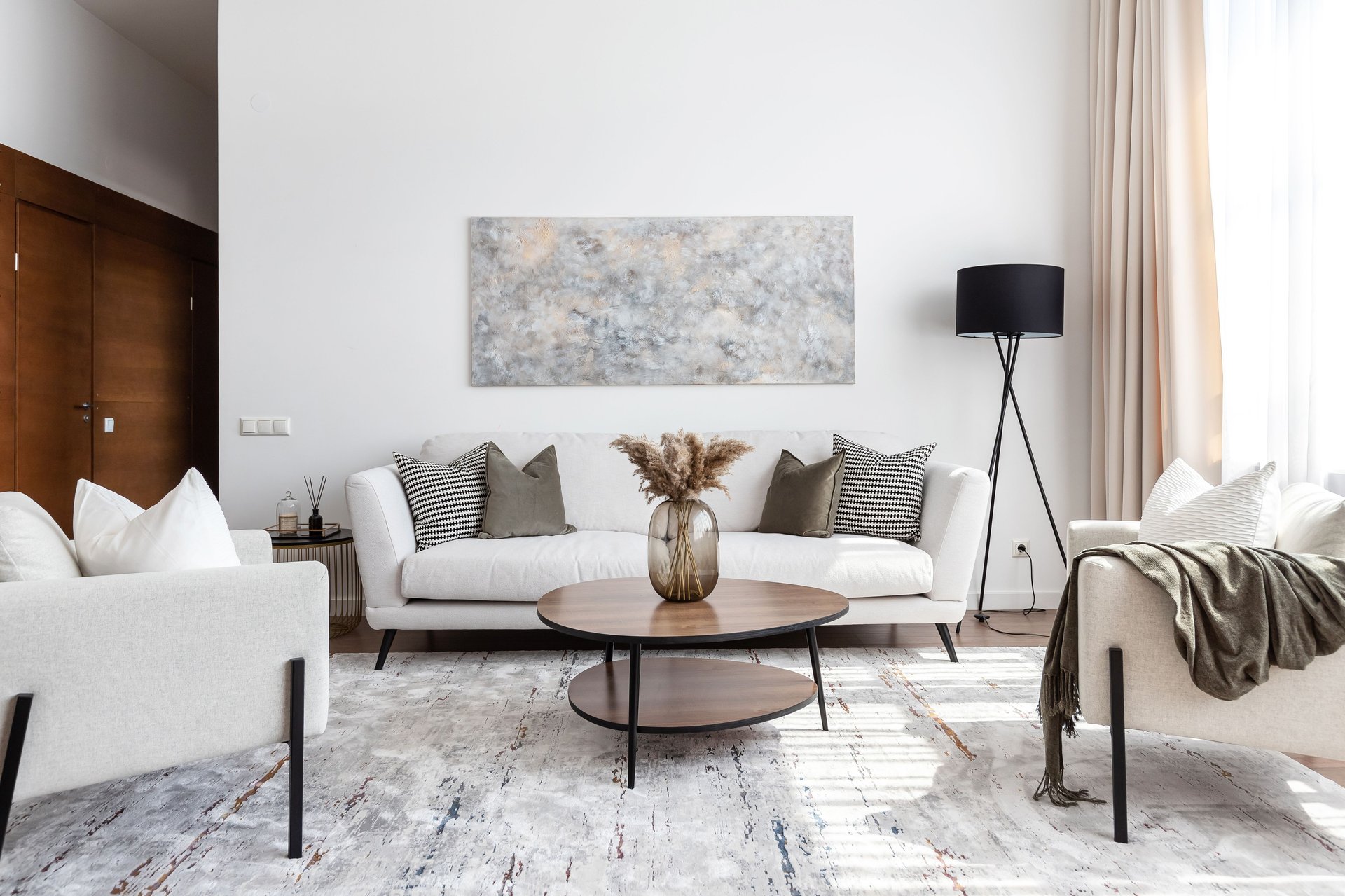 an abstract photo of a curved building with a blue sky in the background