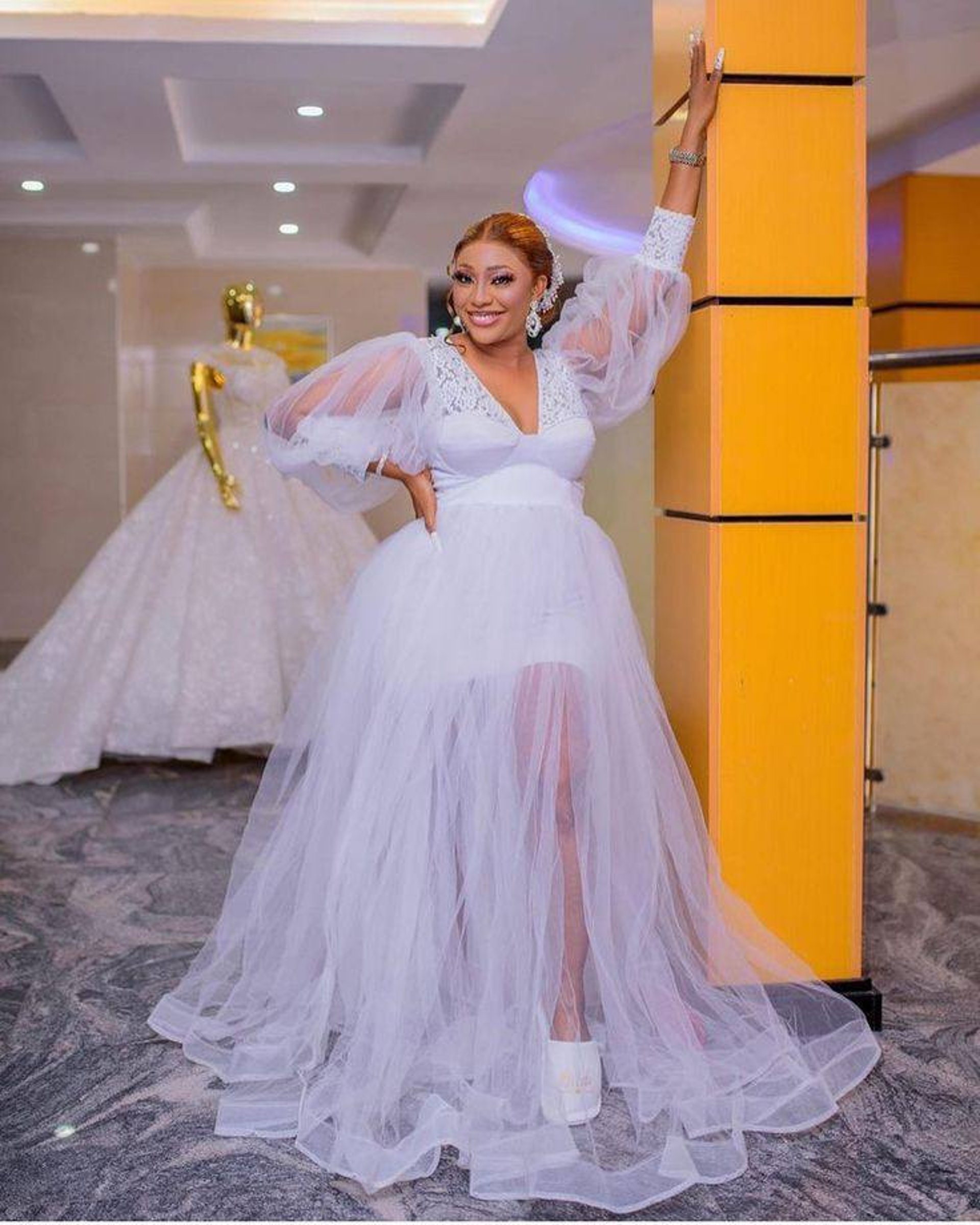 white and brown wooden bed frame