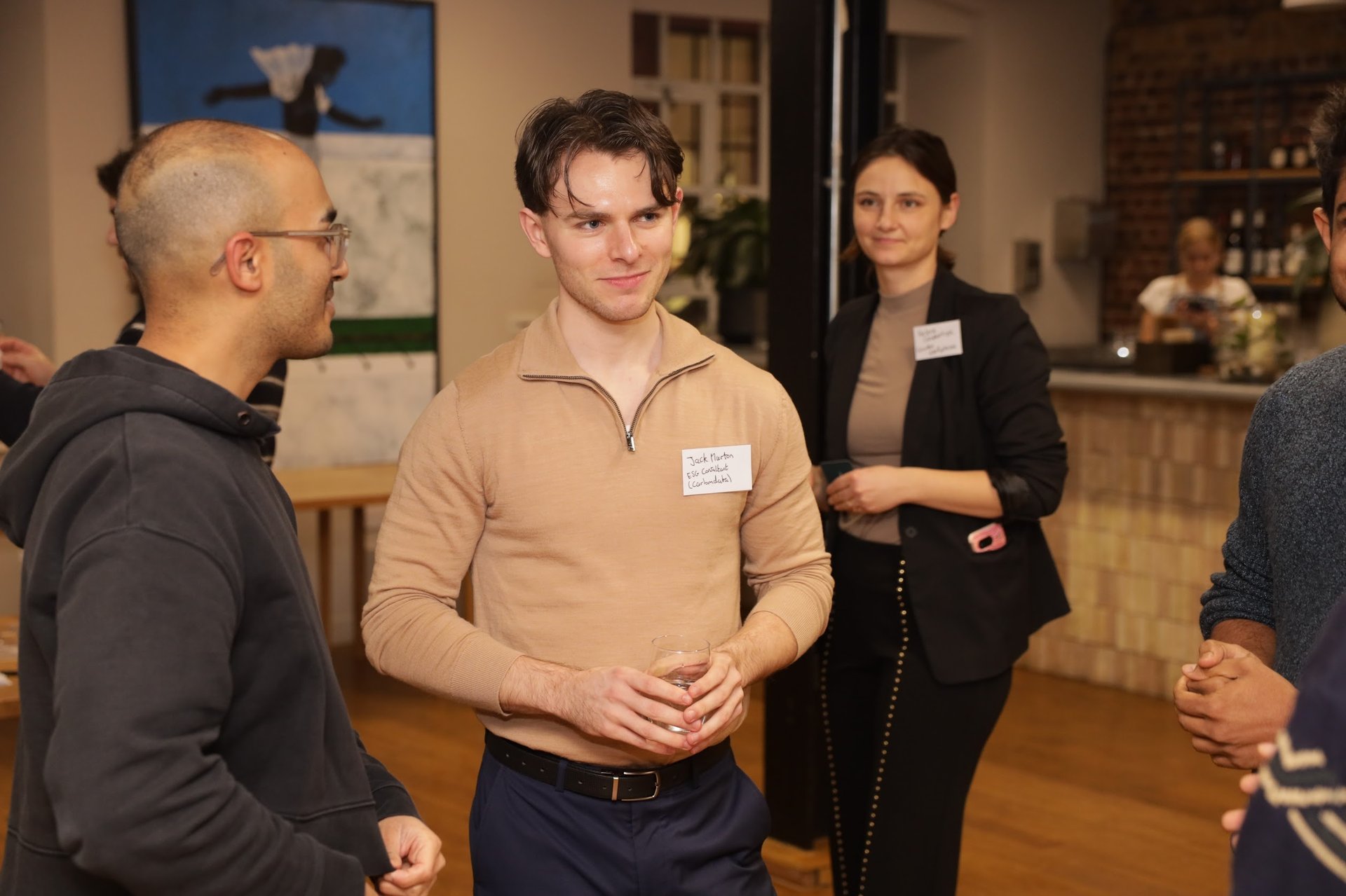 black and brown leather padded tub sofa