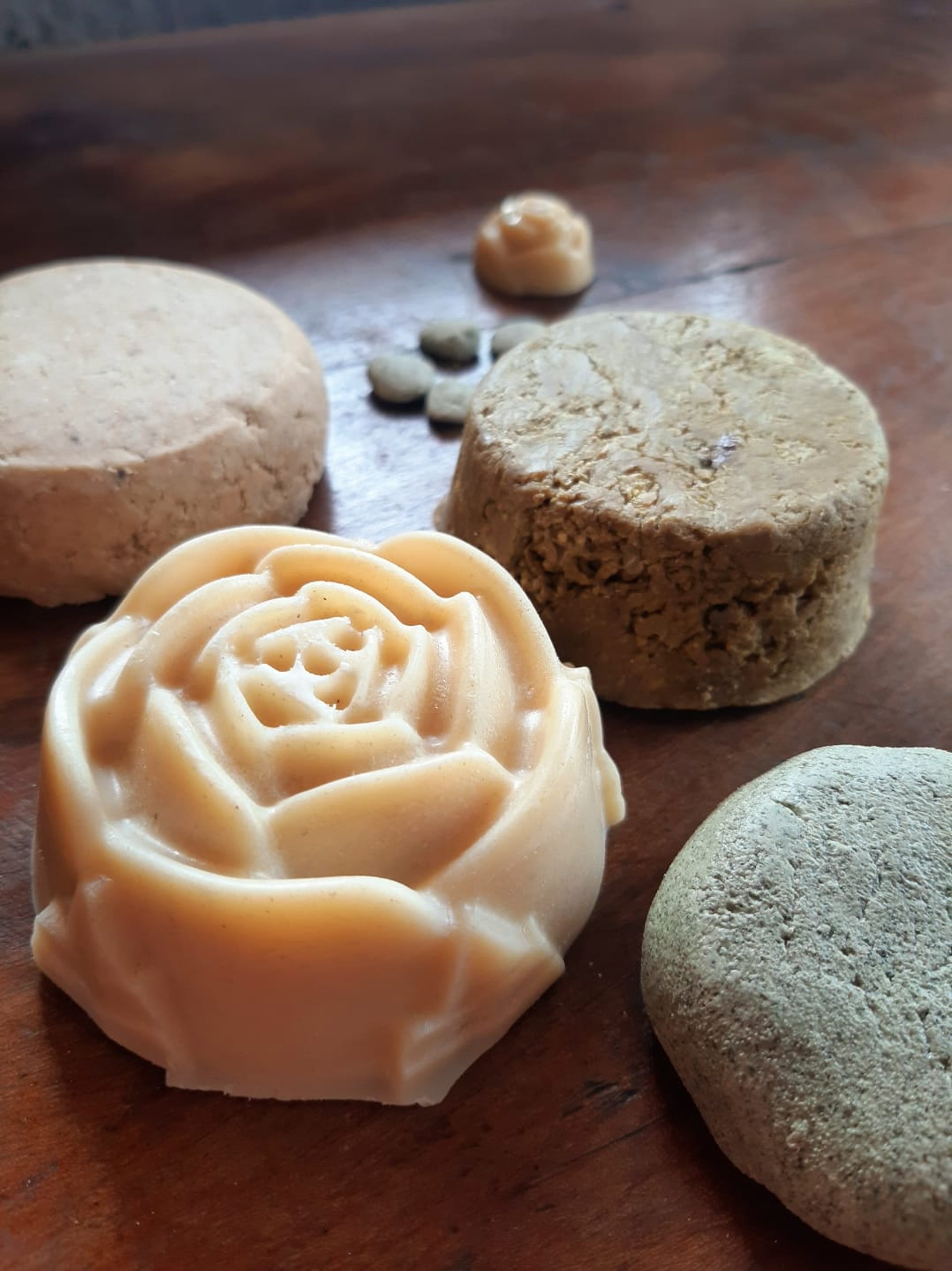 clear glass bottle on white textile