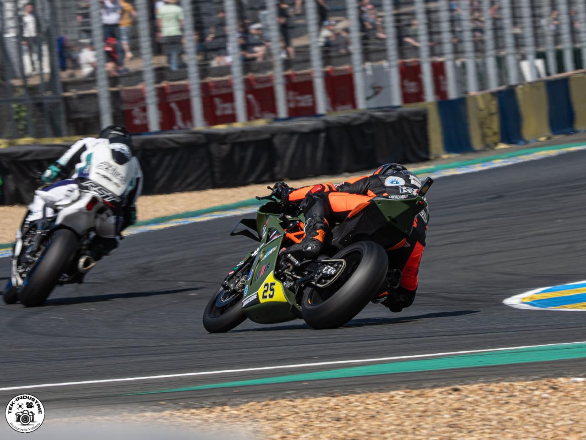 an abstract photo of a curved building with a blue sky in the background