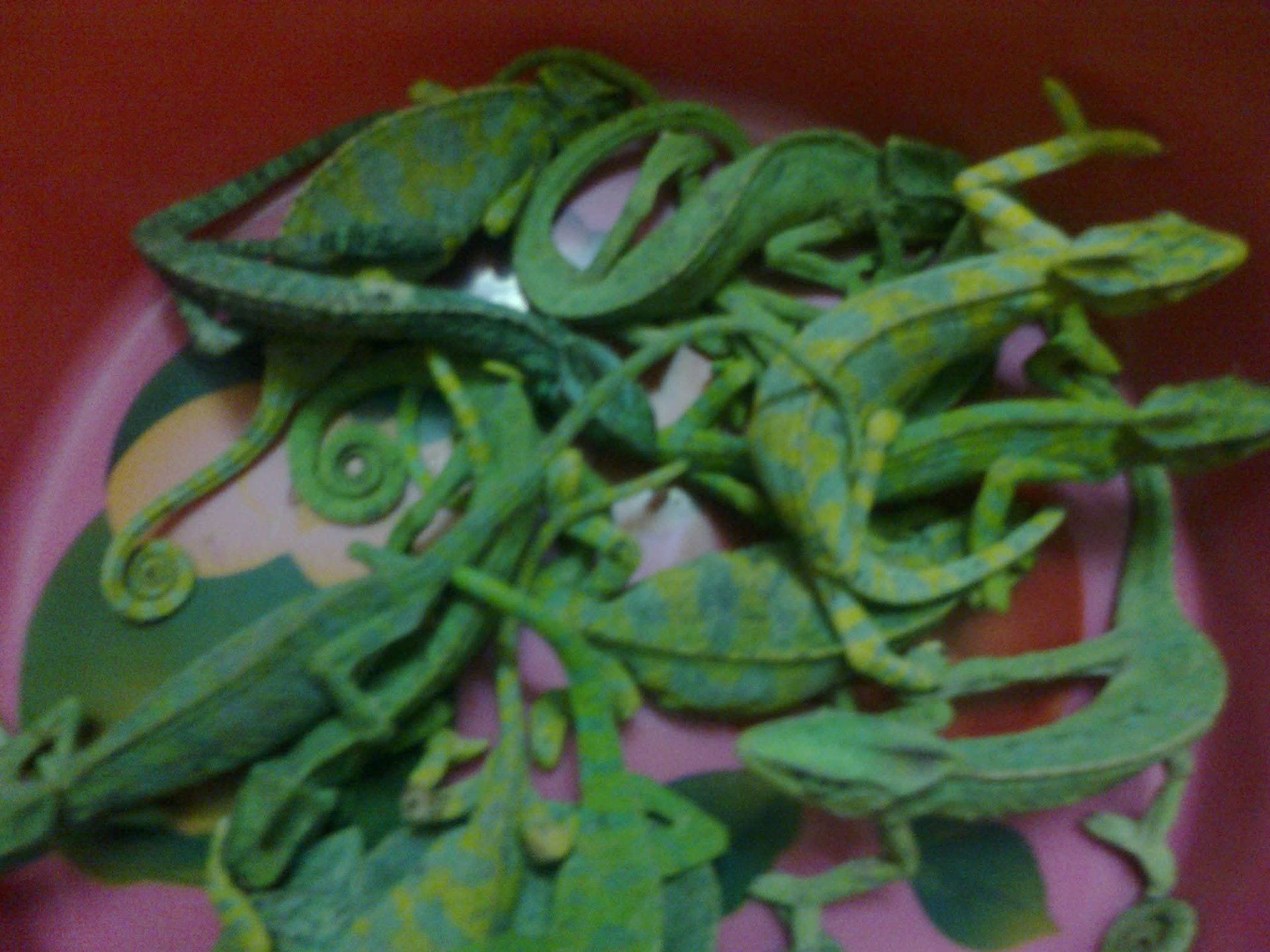 an abstract photo of a curved building with a blue sky in the background