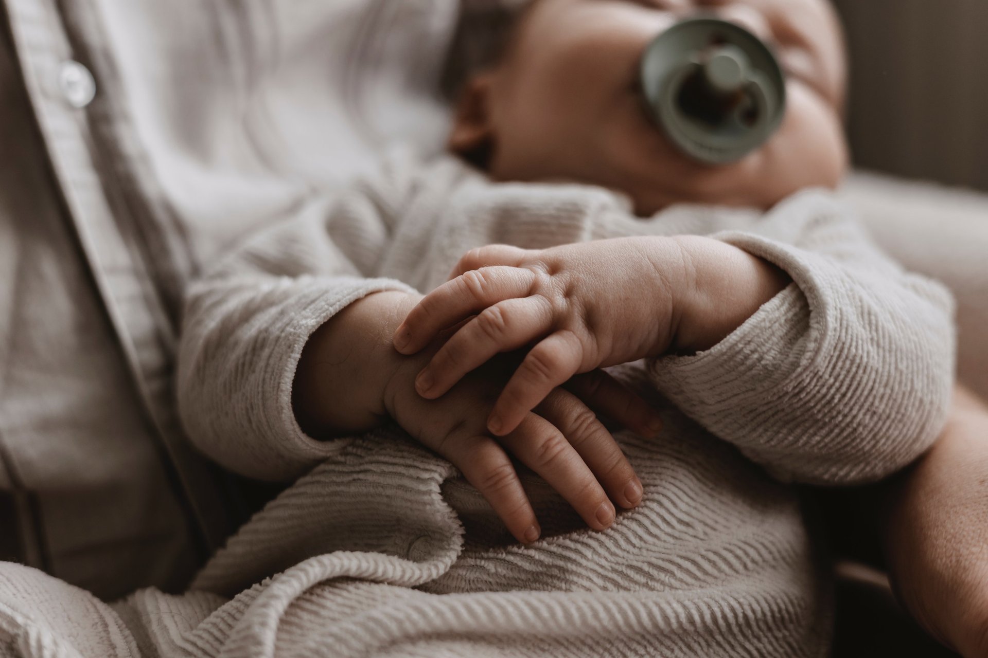 an abstract photo of a curved building with a blue sky in the background
