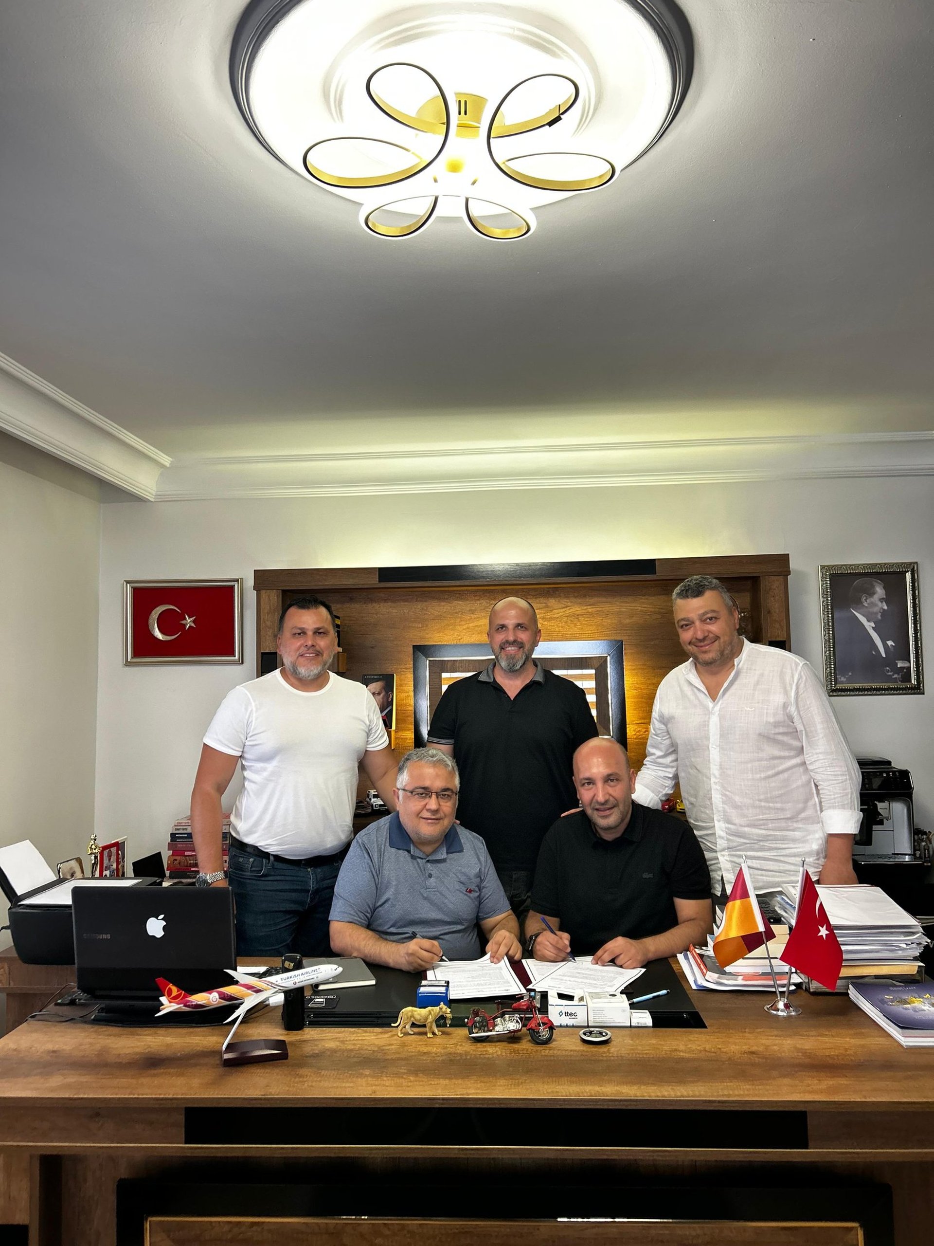 black and brown leather padded tub sofa