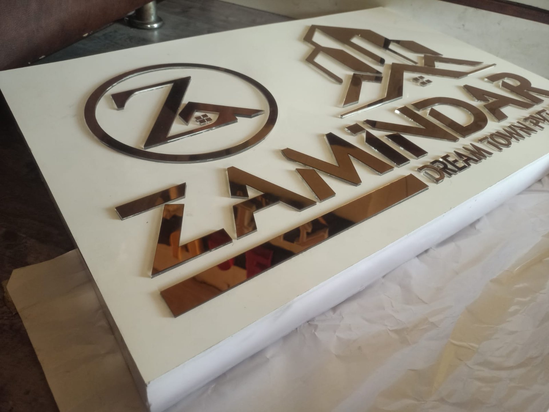 an abstract photo of a curved building with a blue sky in the background