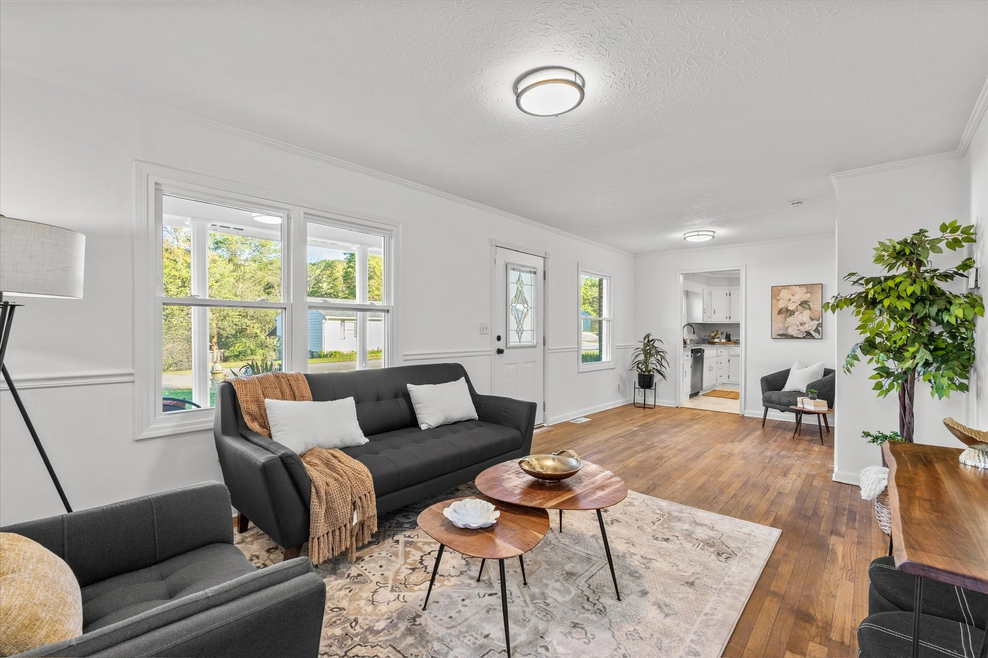 black and brown leather padded tub sofa