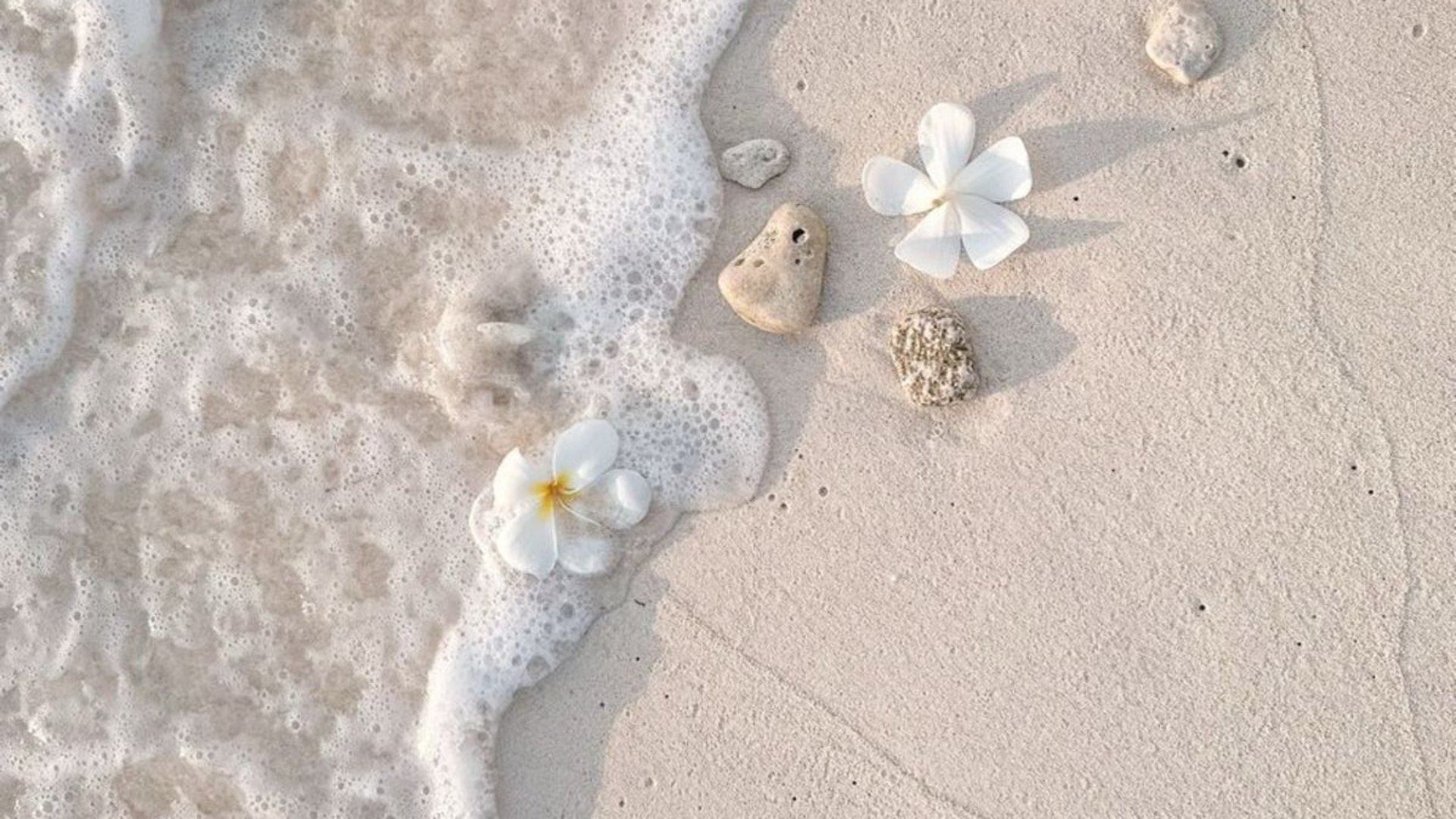 woman wearing yellow long-sleeved dress under white clouds and blue sky during daytime