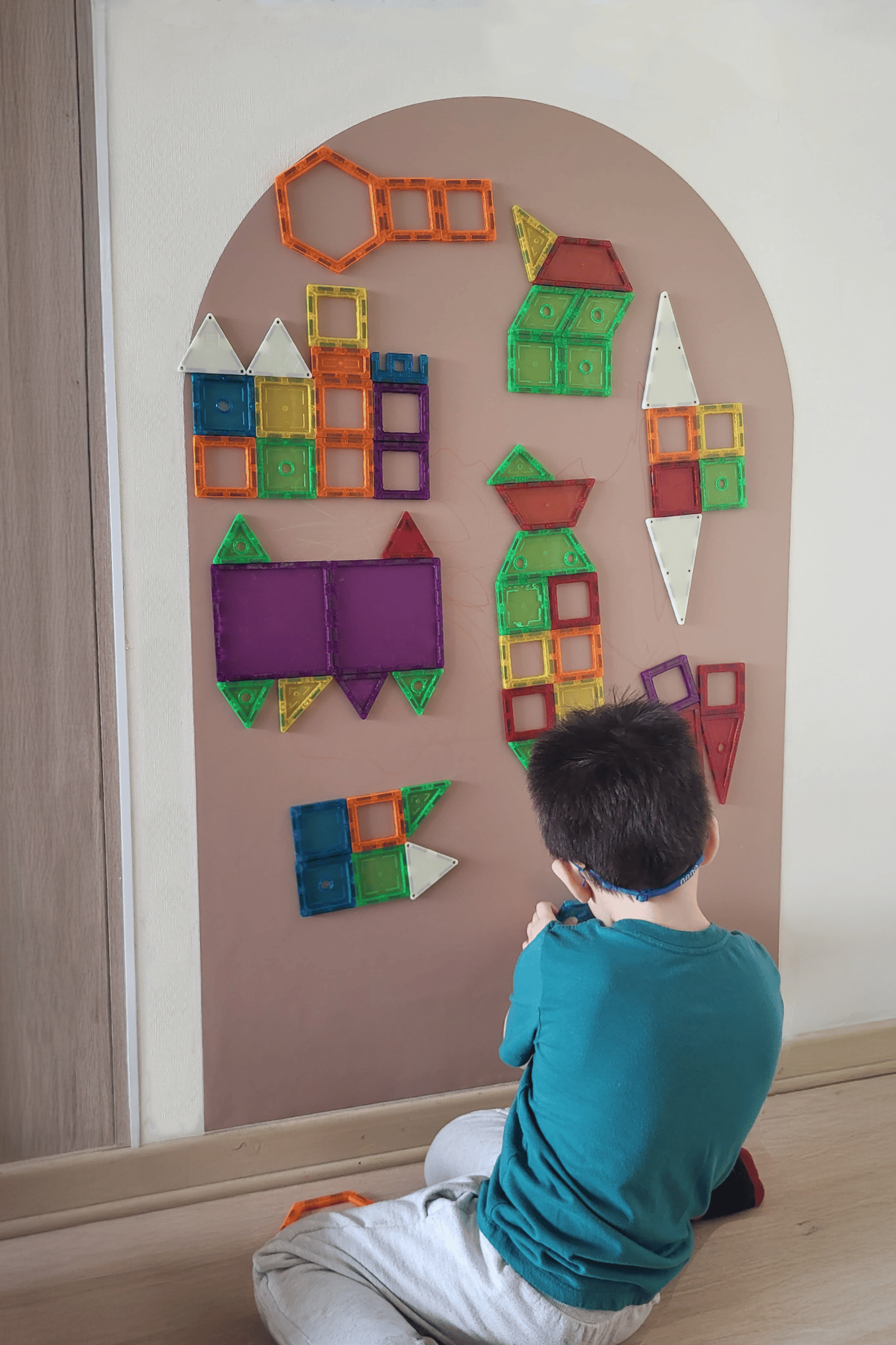 an abstract photo of a curved building with a blue sky in the background