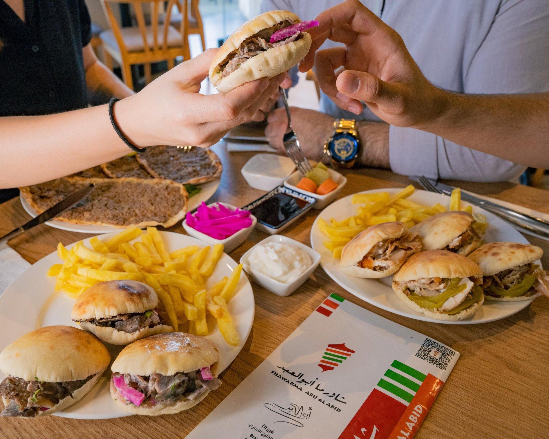 black and brown leather padded tub sofa
