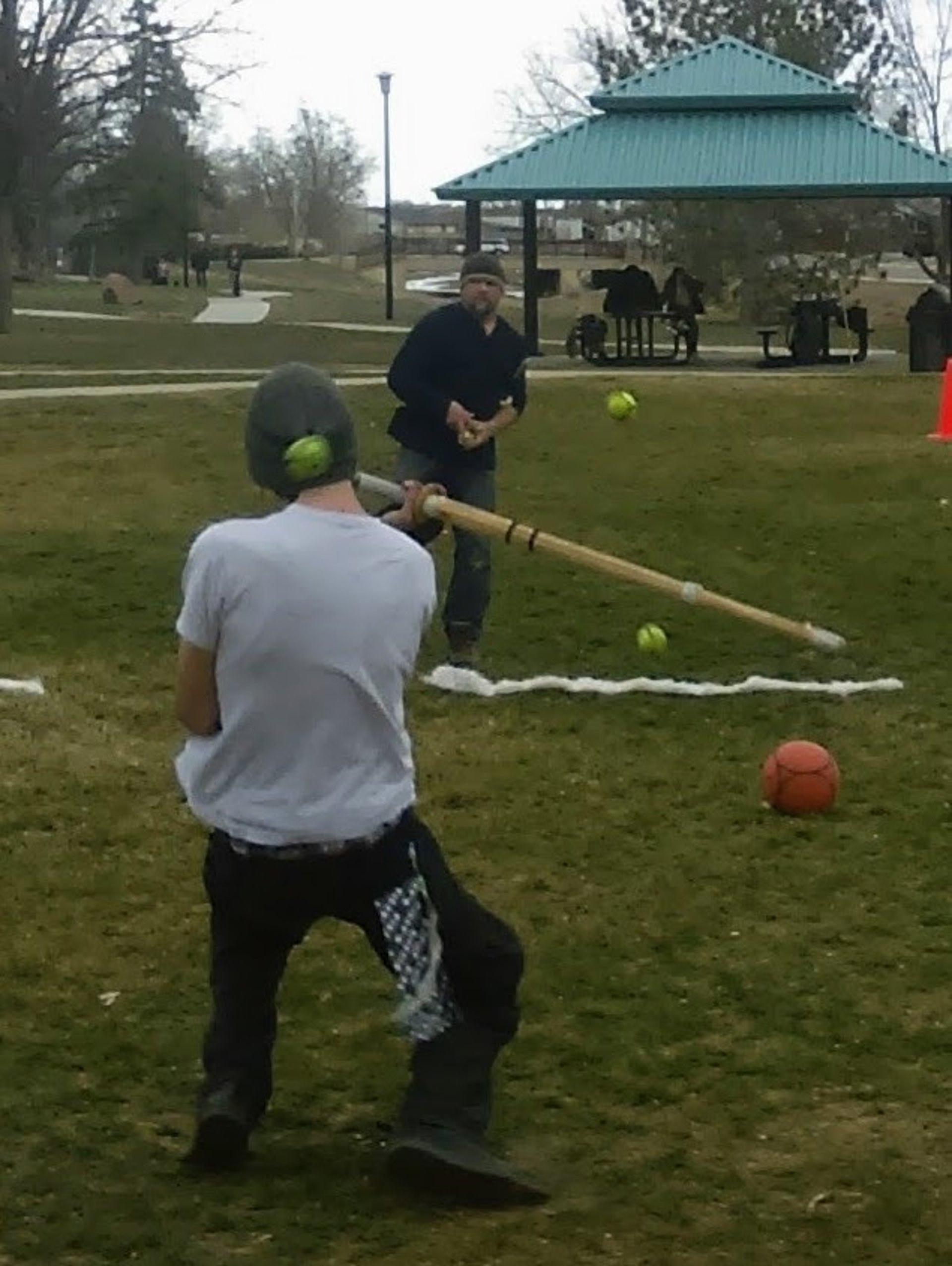 person wearing grey knit sweater