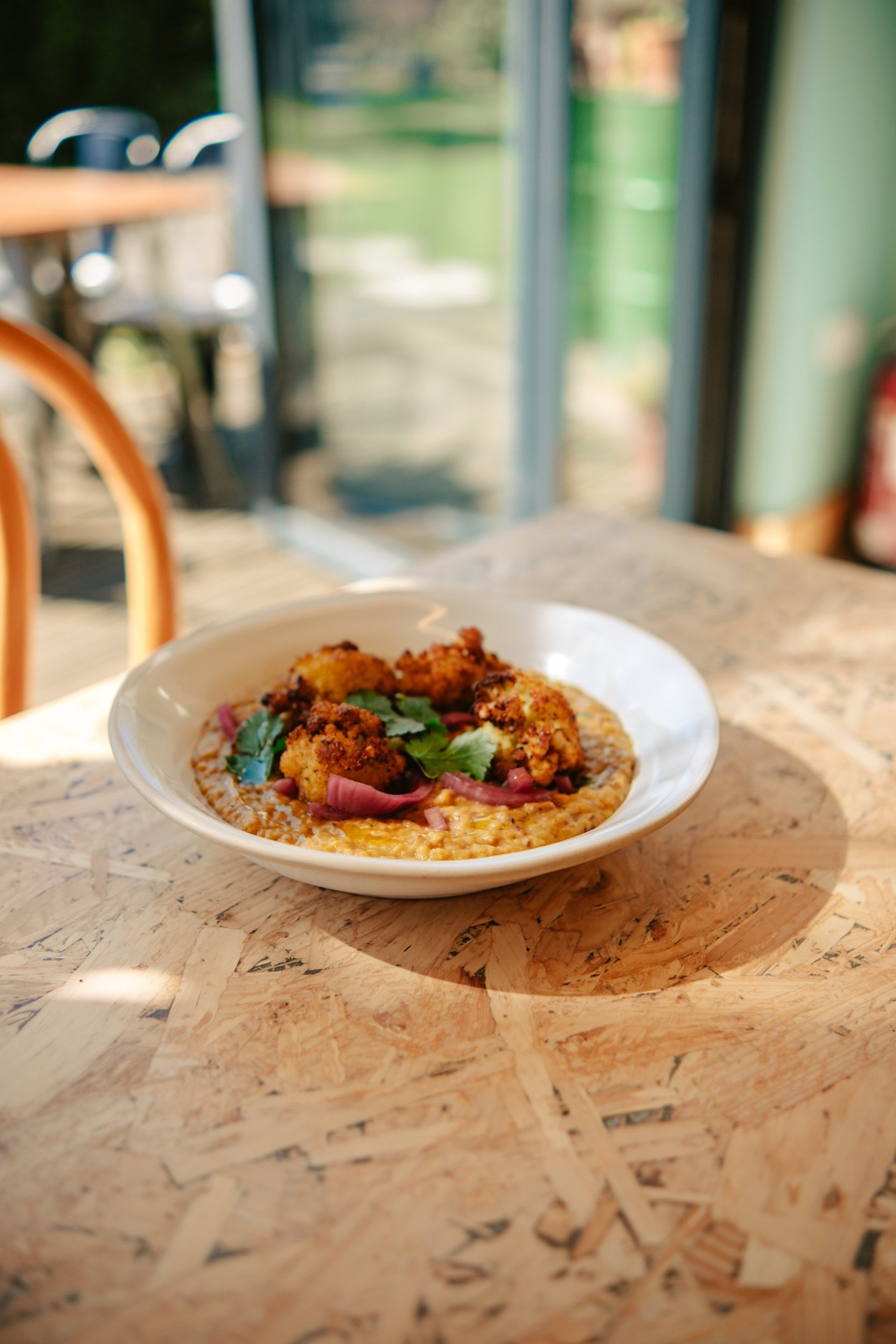 Coconut & red lentil dal with spiced cauliflower on the lunch menu