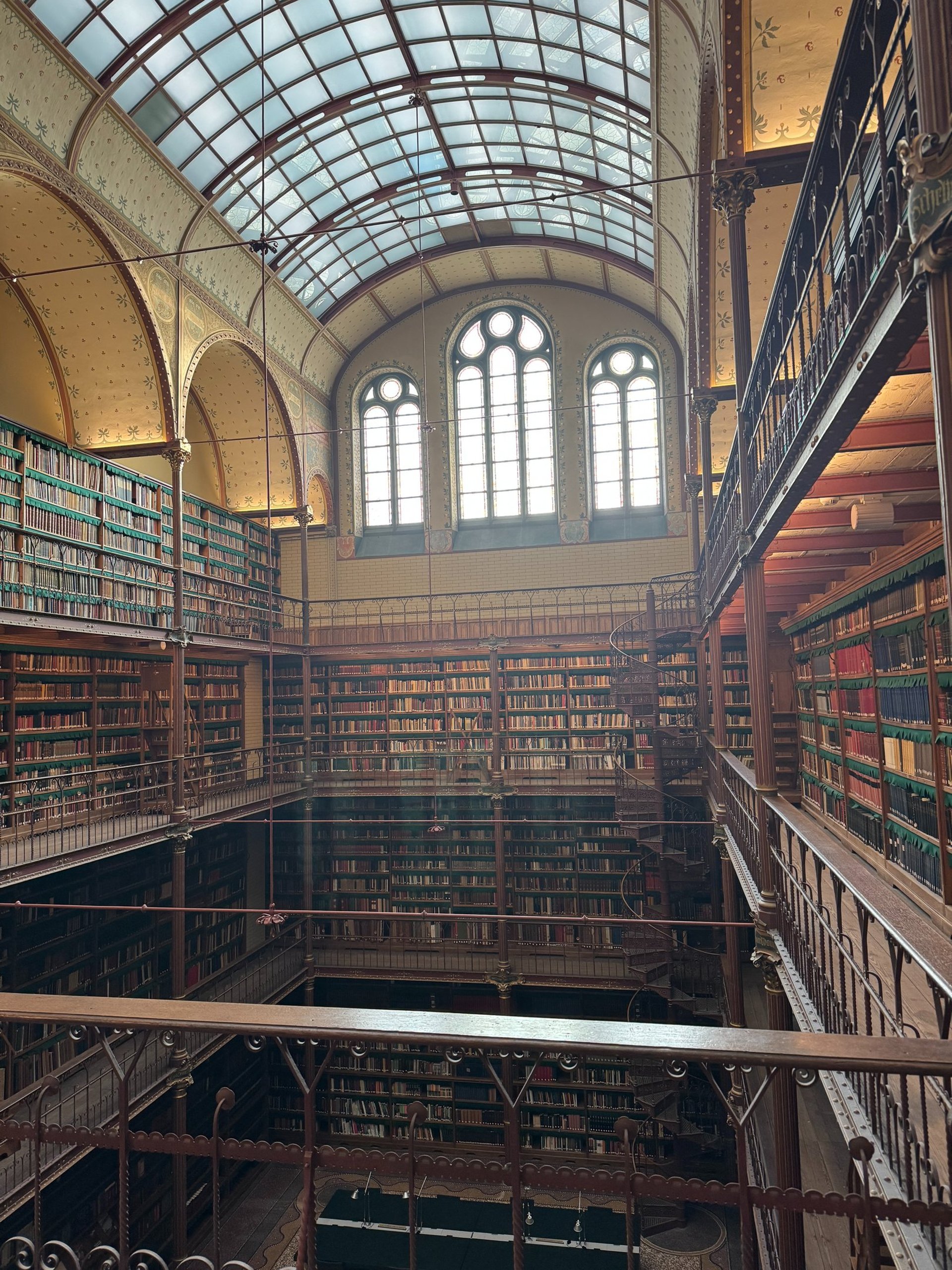 woman wearing yellow long-sleeved dress under white clouds and blue sky during daytime