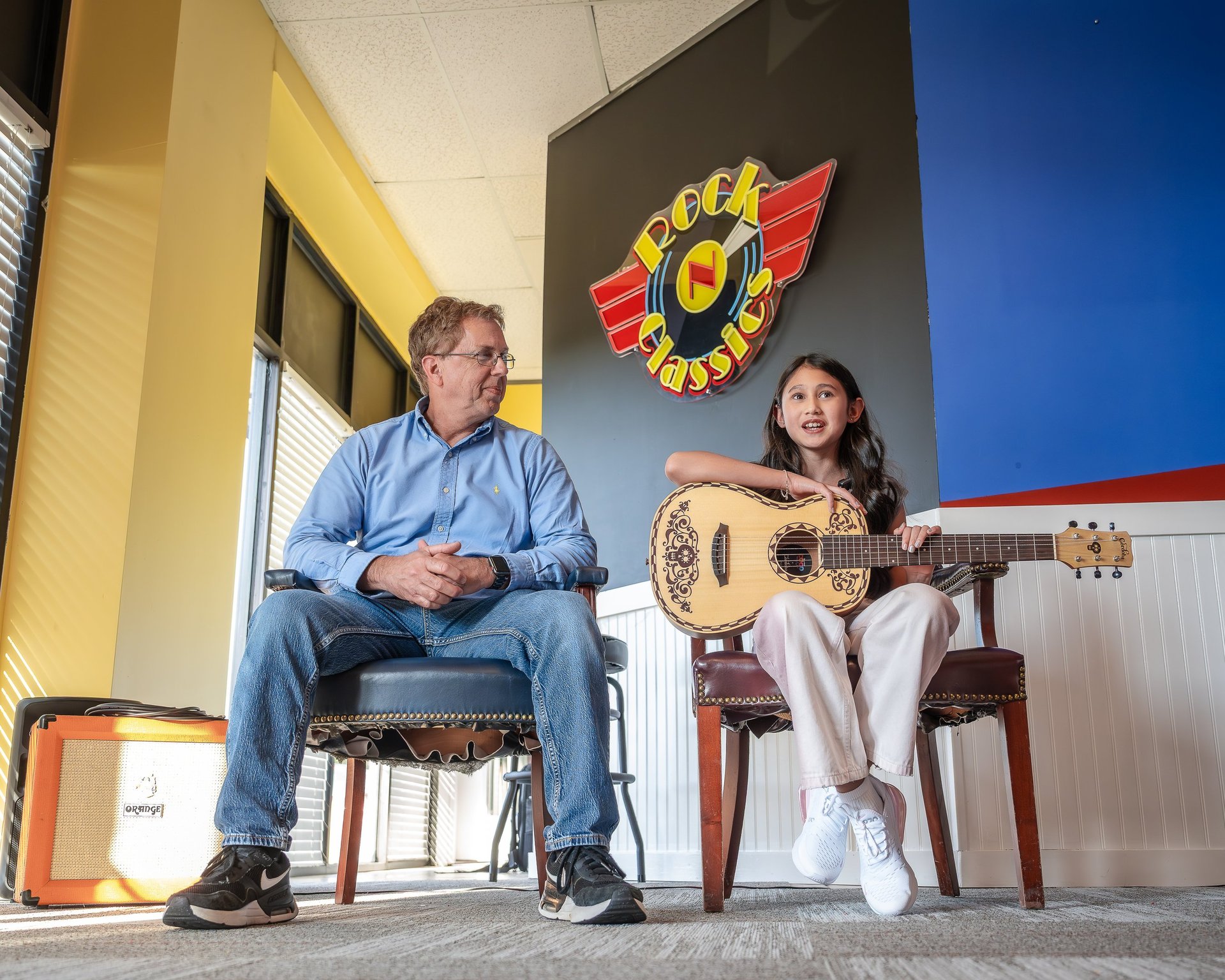 woman wearing yellow long-sleeved dress under white clouds and blue sky during daytime