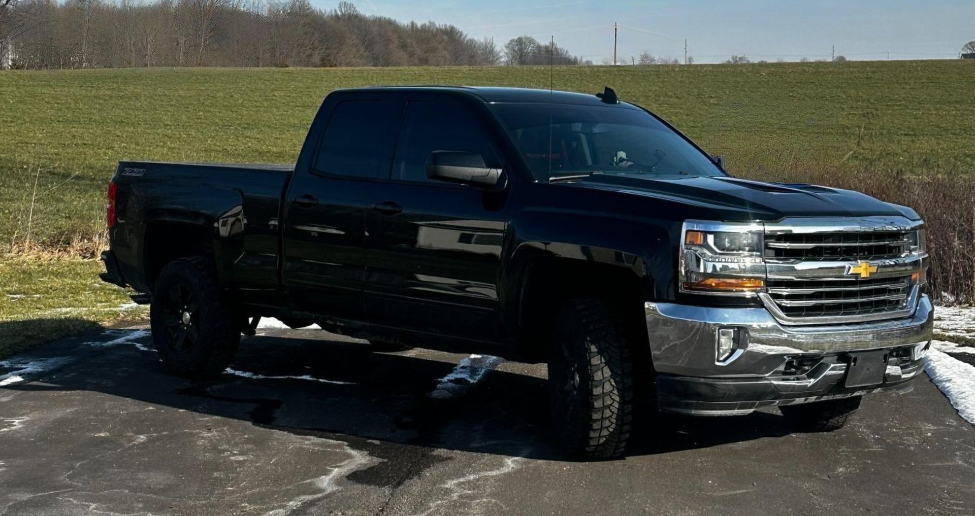 black and brown leather padded tub sofa