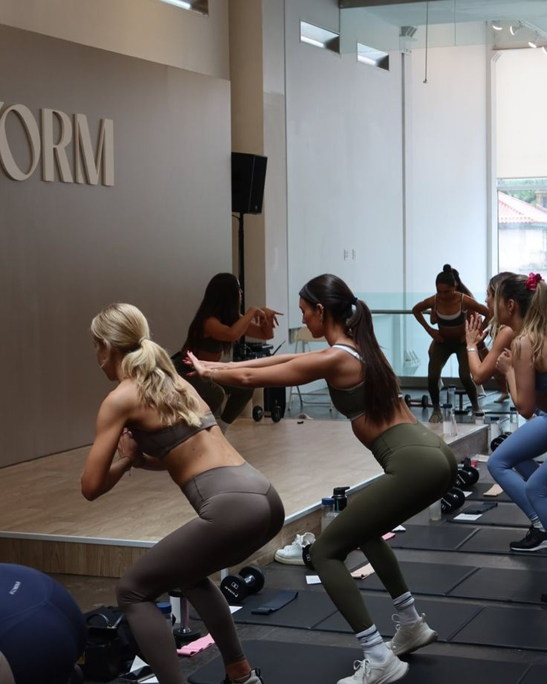 woman wearing yellow long-sleeved dress under white clouds and blue sky during daytime