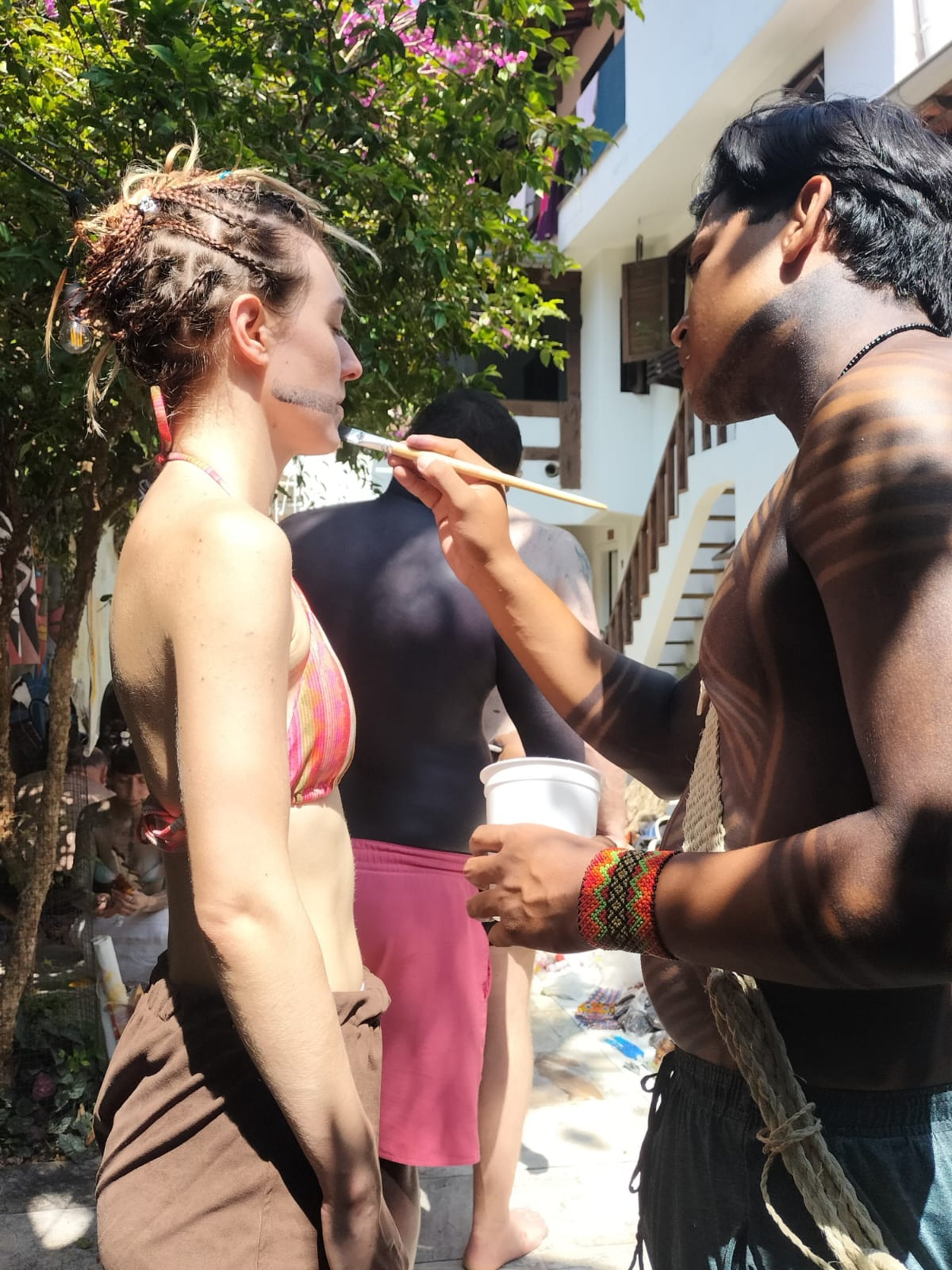 an abstract photo of a curved building with a blue sky in the background
