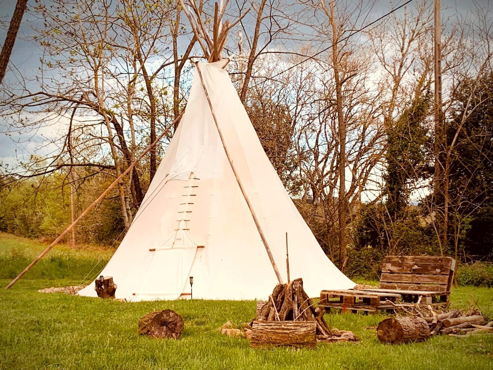 an abstract photo of a curved building with a blue sky in the background