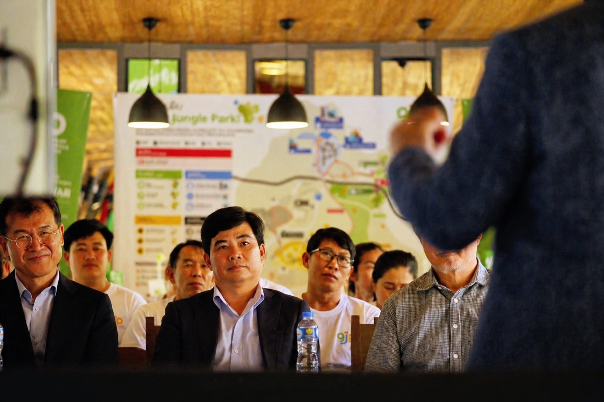 an abstract photo of a curved building with a blue sky in the background