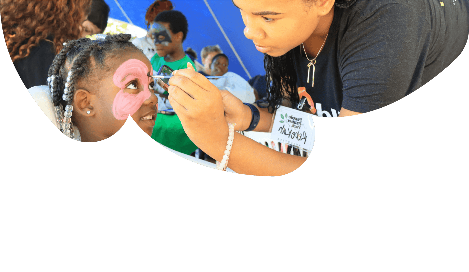 woman in red shirt sitting on white chair