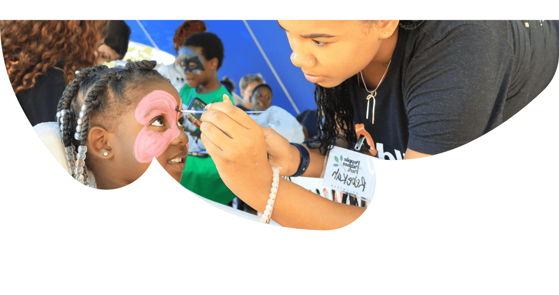 woman in red shirt sitting on white chair