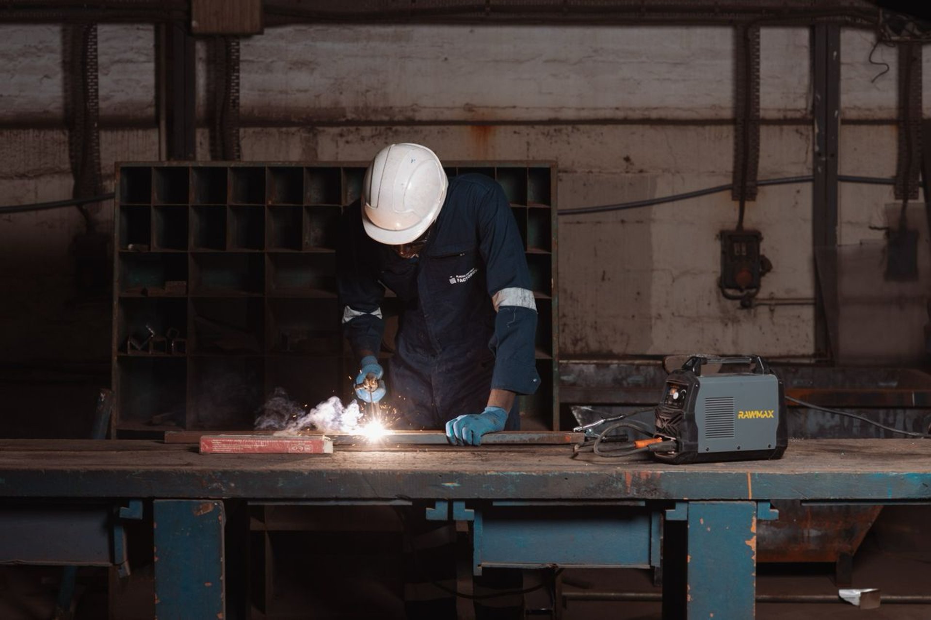 an abstract photo of a curved building with a blue sky in the background