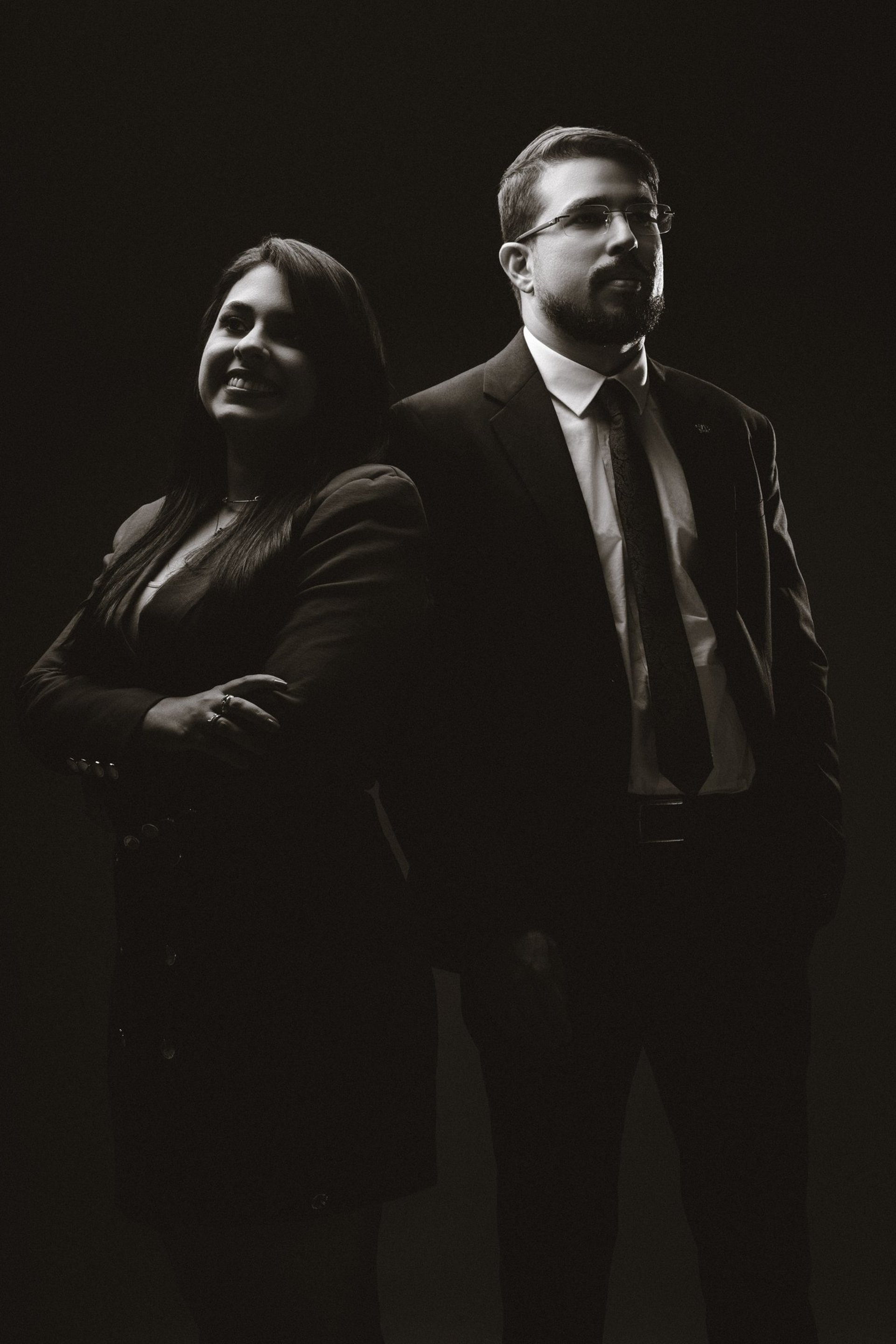 woman in dress holding sword figurine