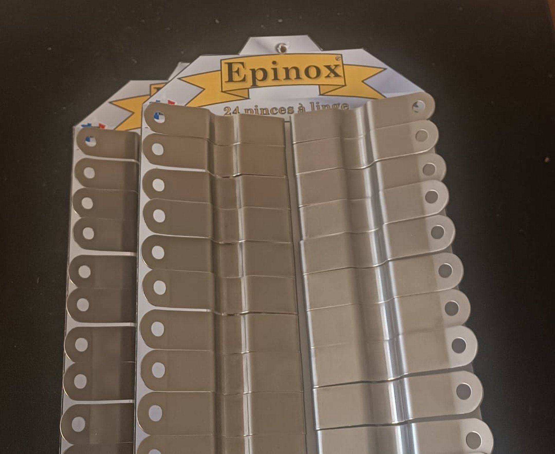 person wearing grey knit sweater