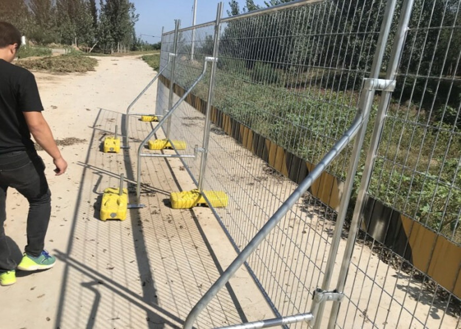 an abstract photo of a curved building with a blue sky in the background