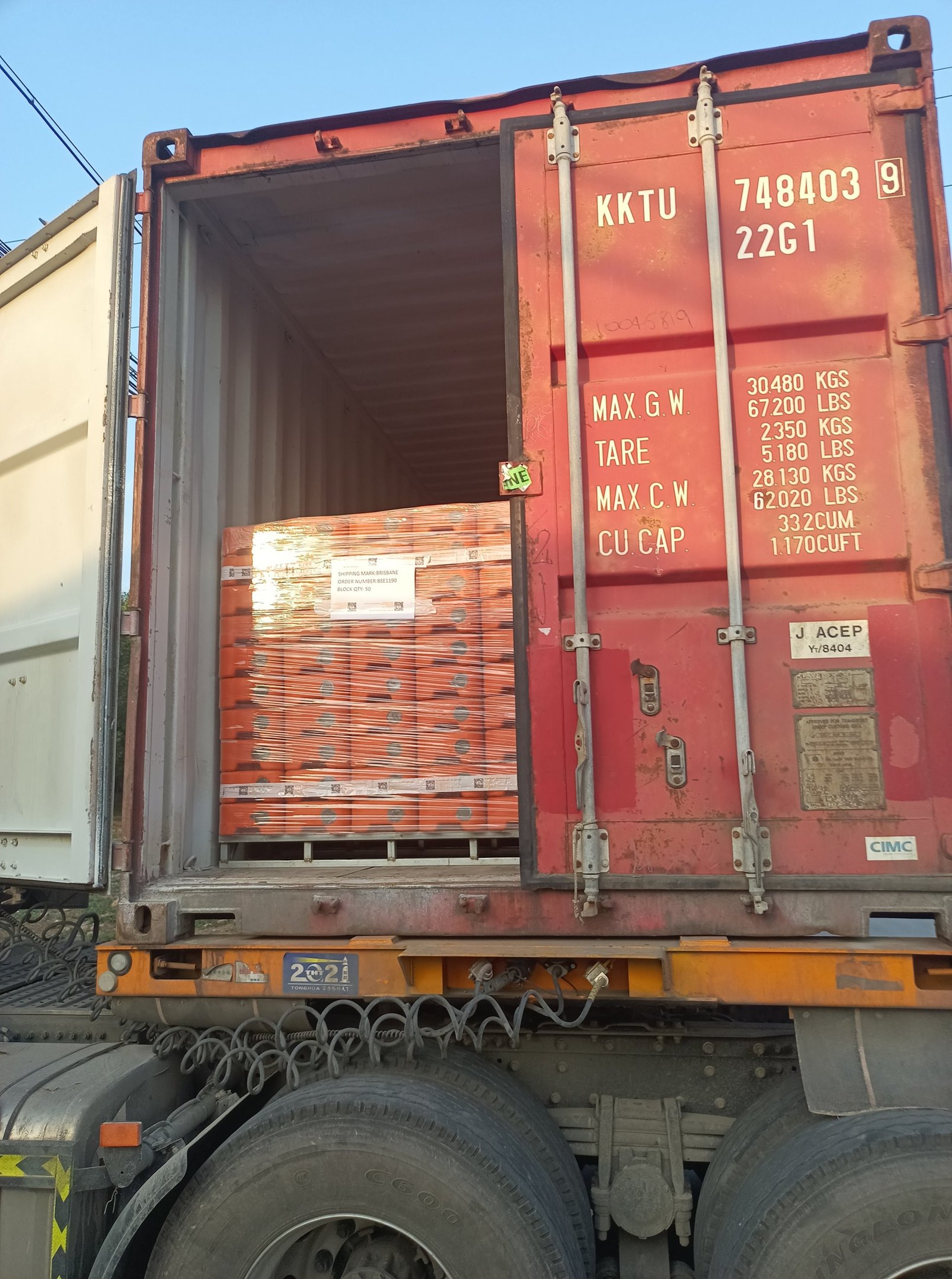 an abstract photo of a curved building with a blue sky in the background