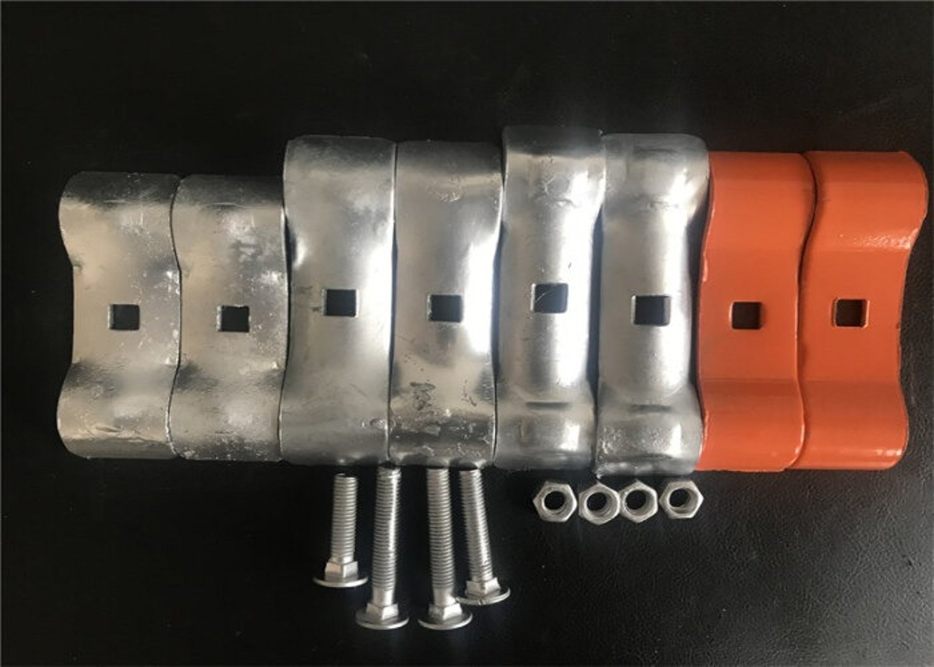 an abstract photo of a curved building with a blue sky in the background