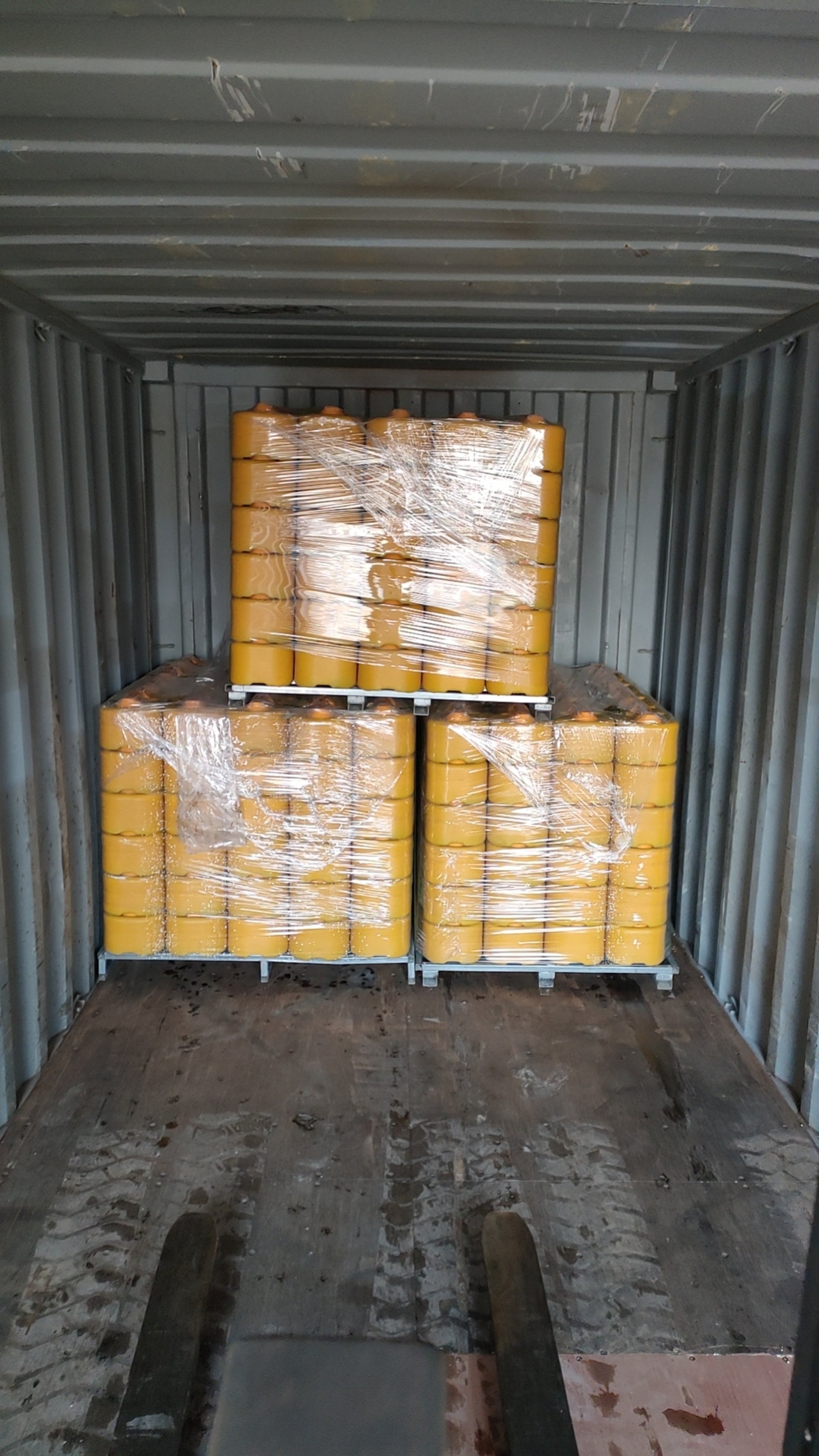 an abstract photo of a curved building with a blue sky in the background