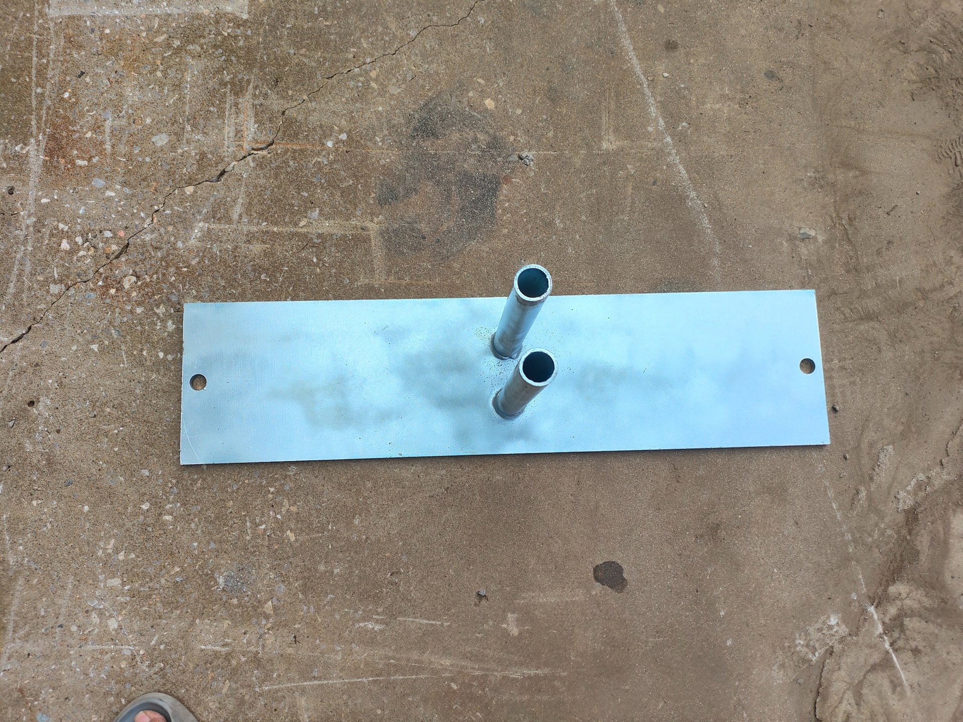 an abstract photo of a curved building with a blue sky in the background