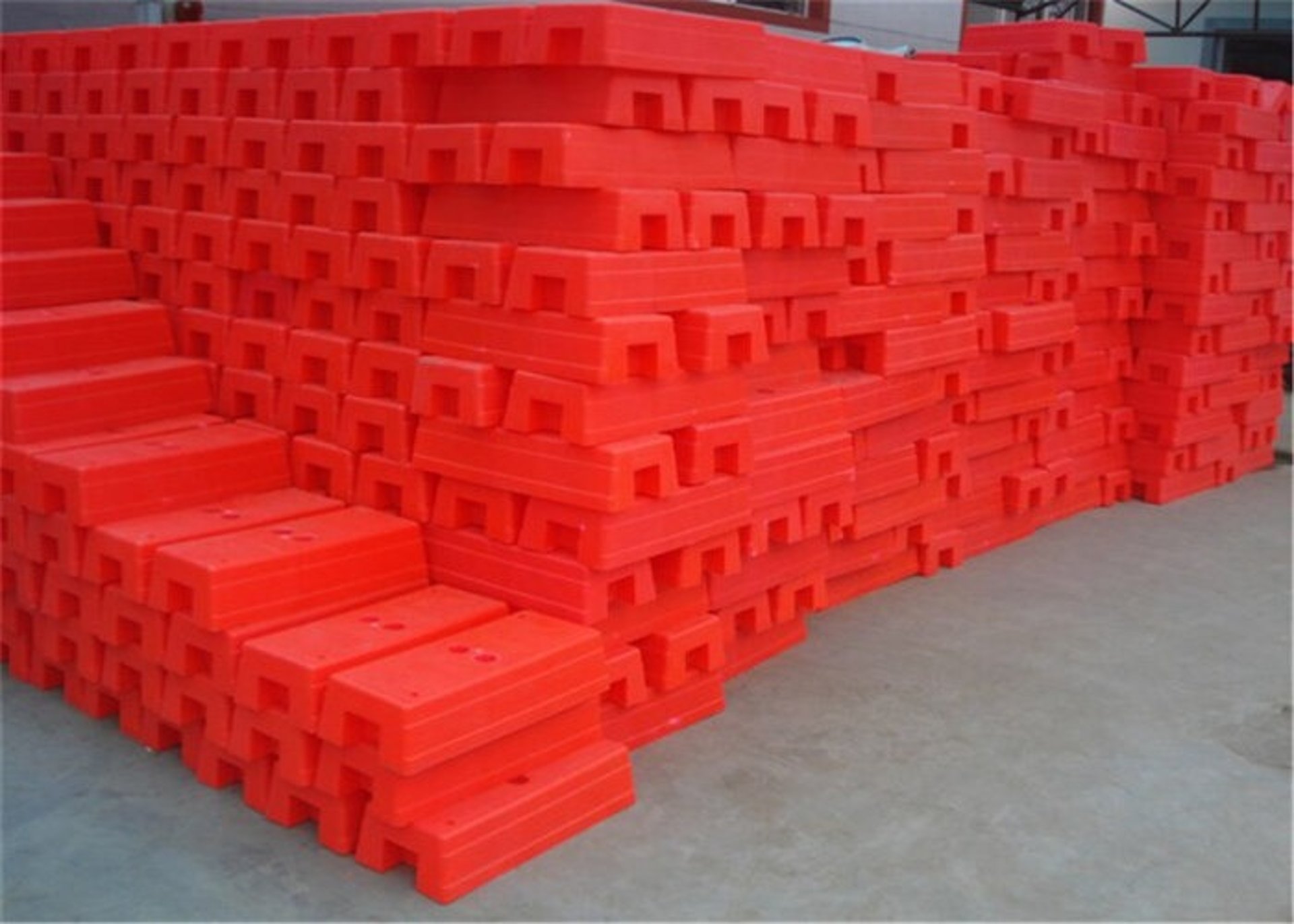 an abstract photo of a curved building with a blue sky in the background