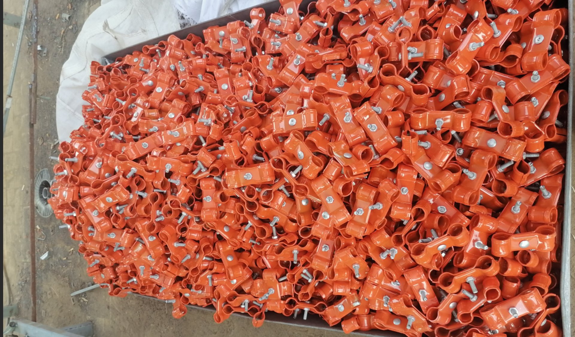 an abstract photo of a curved building with a blue sky in the background