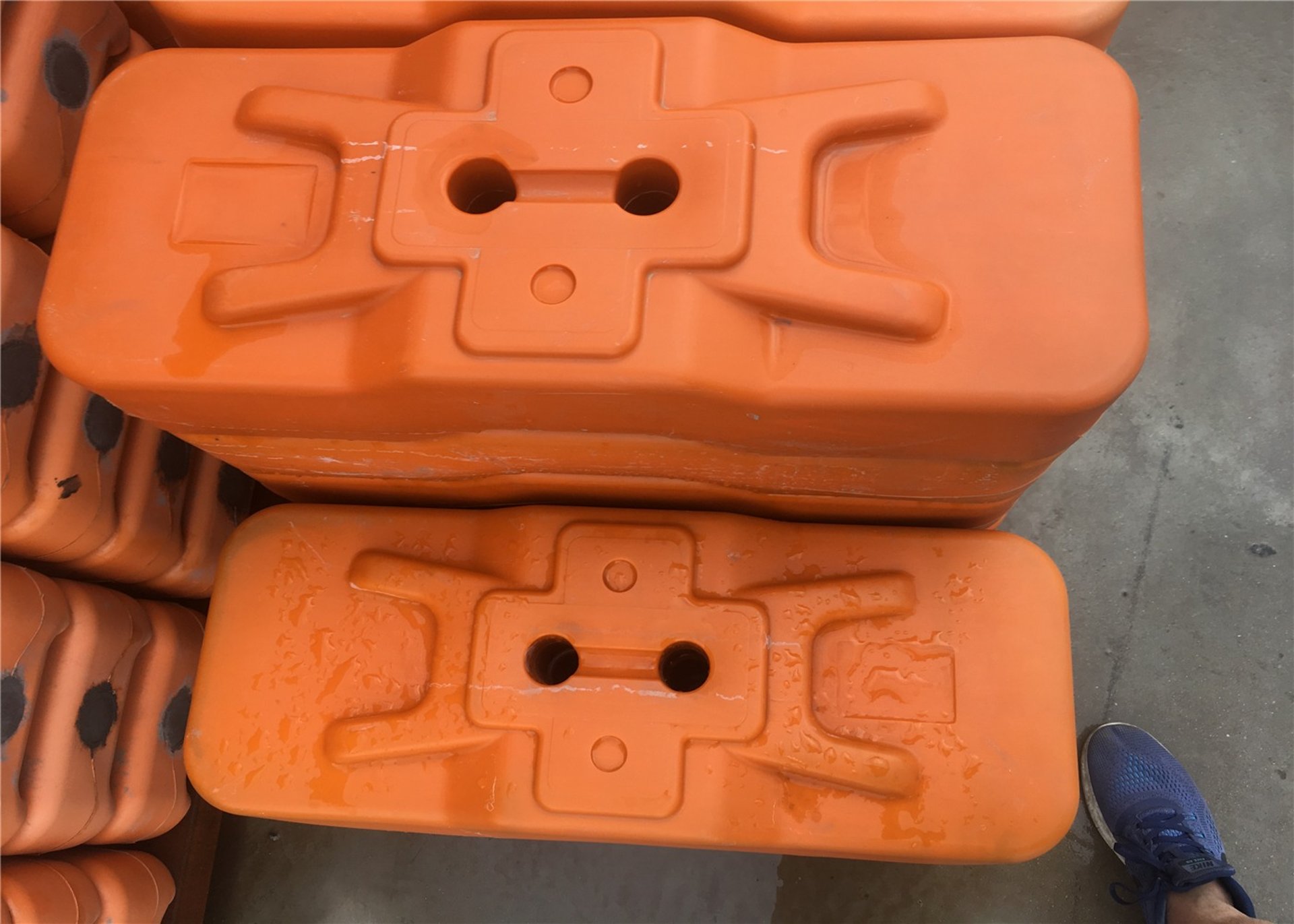 an abstract photo of a curved building with a blue sky in the background